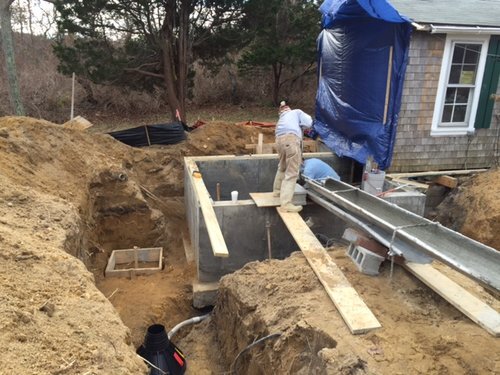   Excavating utilities foundation  