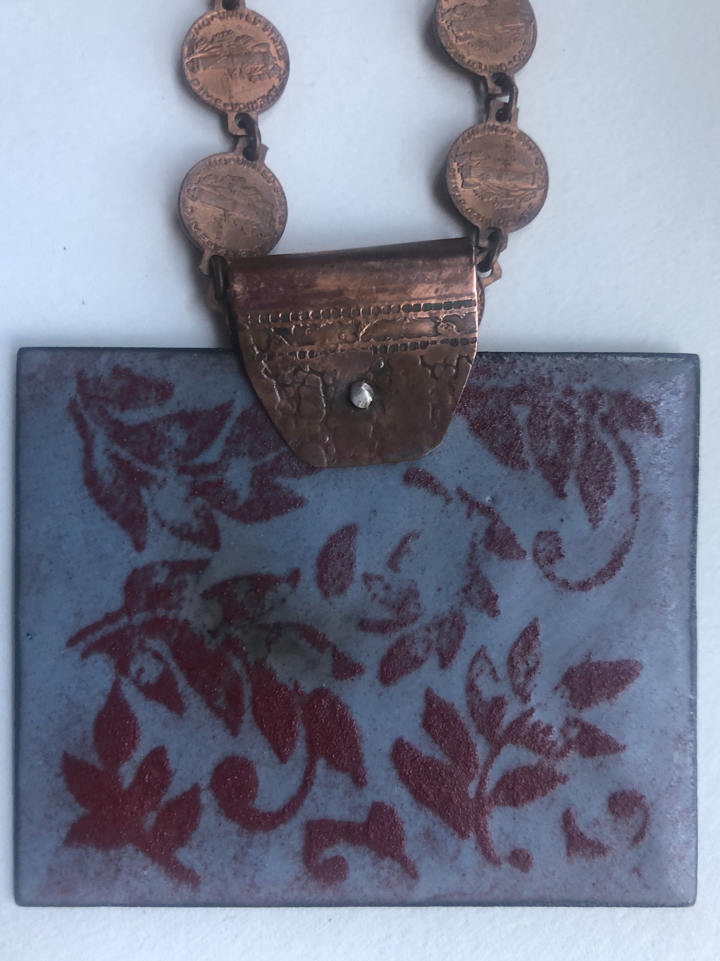 Two-sided enamel plant print necklace