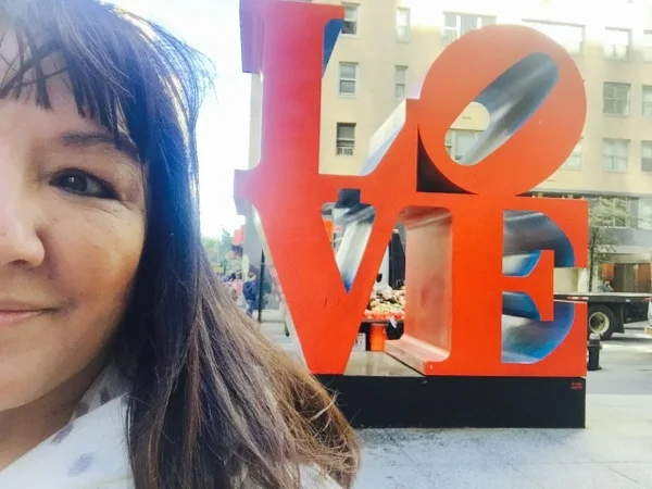Selfie near my NYC hotel — The sculpture by Robert Indiana that pretty much says it all. Also had to give in and buy an "I love Pope Francis" t-shirt, too... and I'm not even Catholic!!! Photo ©2015 Sandra CisnerosPhoto ©2014 Sandra Cisneros