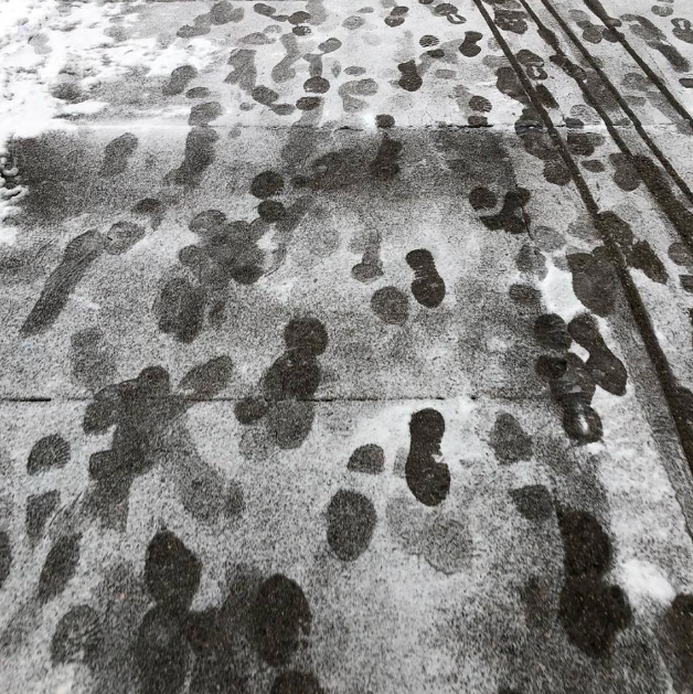 Snowy foot prints in Brooklyn