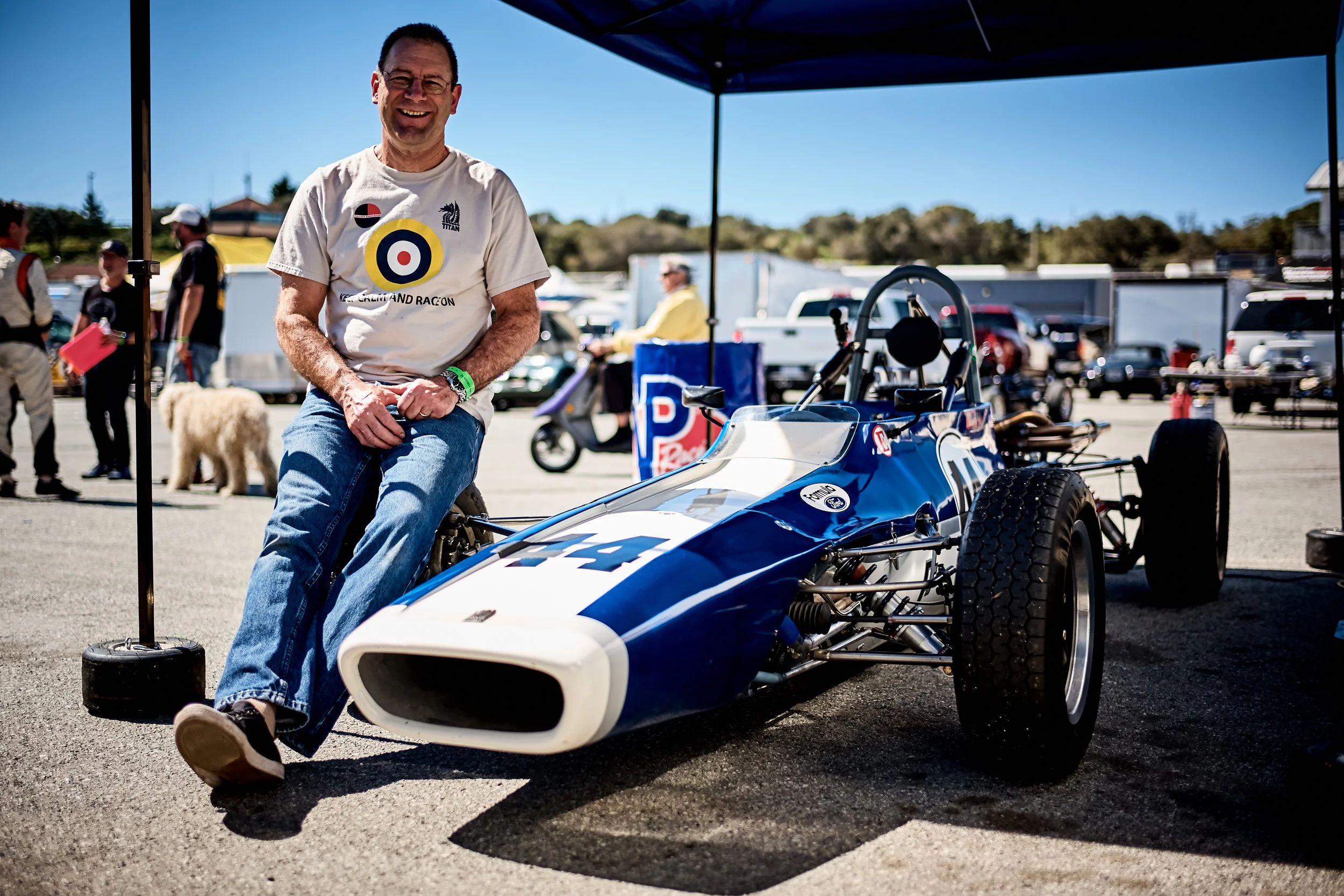 Ed Van Tassel, personifying the weekend, huge smile, fast car, perfect weather