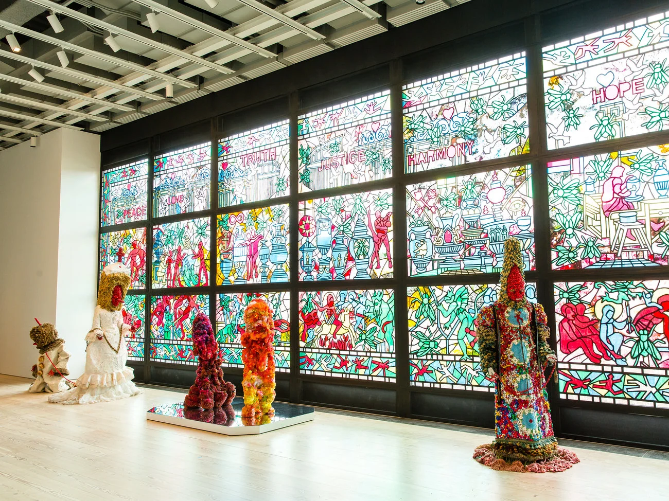 Raúl De Nieves' billboard-size Biennial contribution, beginning & the end neither & the otherwise betwixt & between the end is the beginning & the end , is made from everyday material like tape, paper, glue and beads. Matthew Carasella/Courtesy of The Whitney Museum