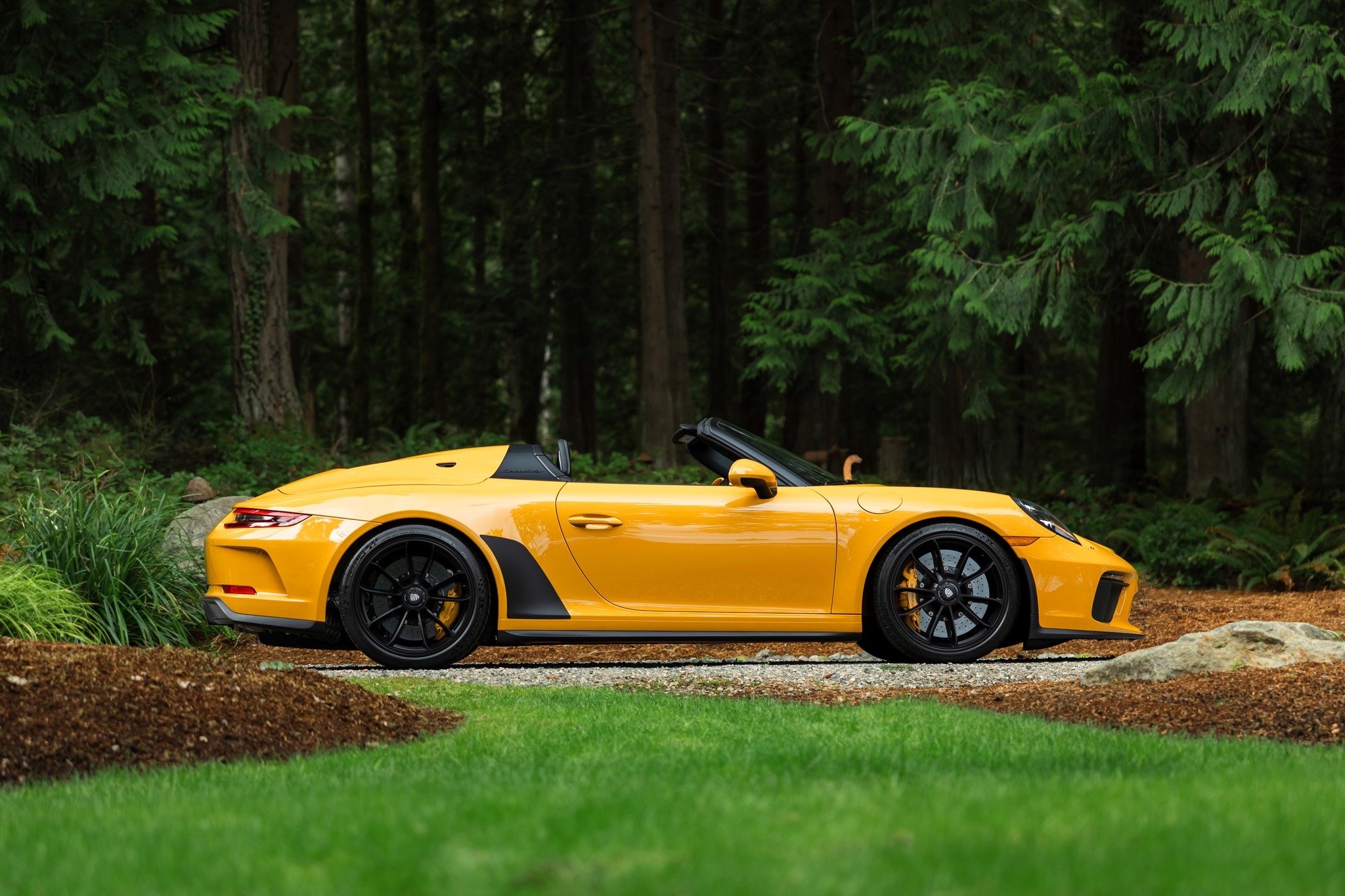 A delicious paint to sample treat -- Our two owner Bahama Yellow Speedster is fresh into inventory. Understood to be just one of two Speedster in this PTS color, this car is striking in person. Effectively a GT3 with the roof removed, the Speedster h