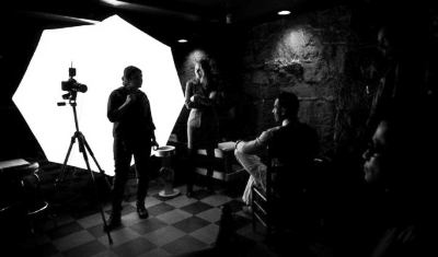 Neda on location directing her subjects for an editorial assignment. Photo by Josh D. Weiss.