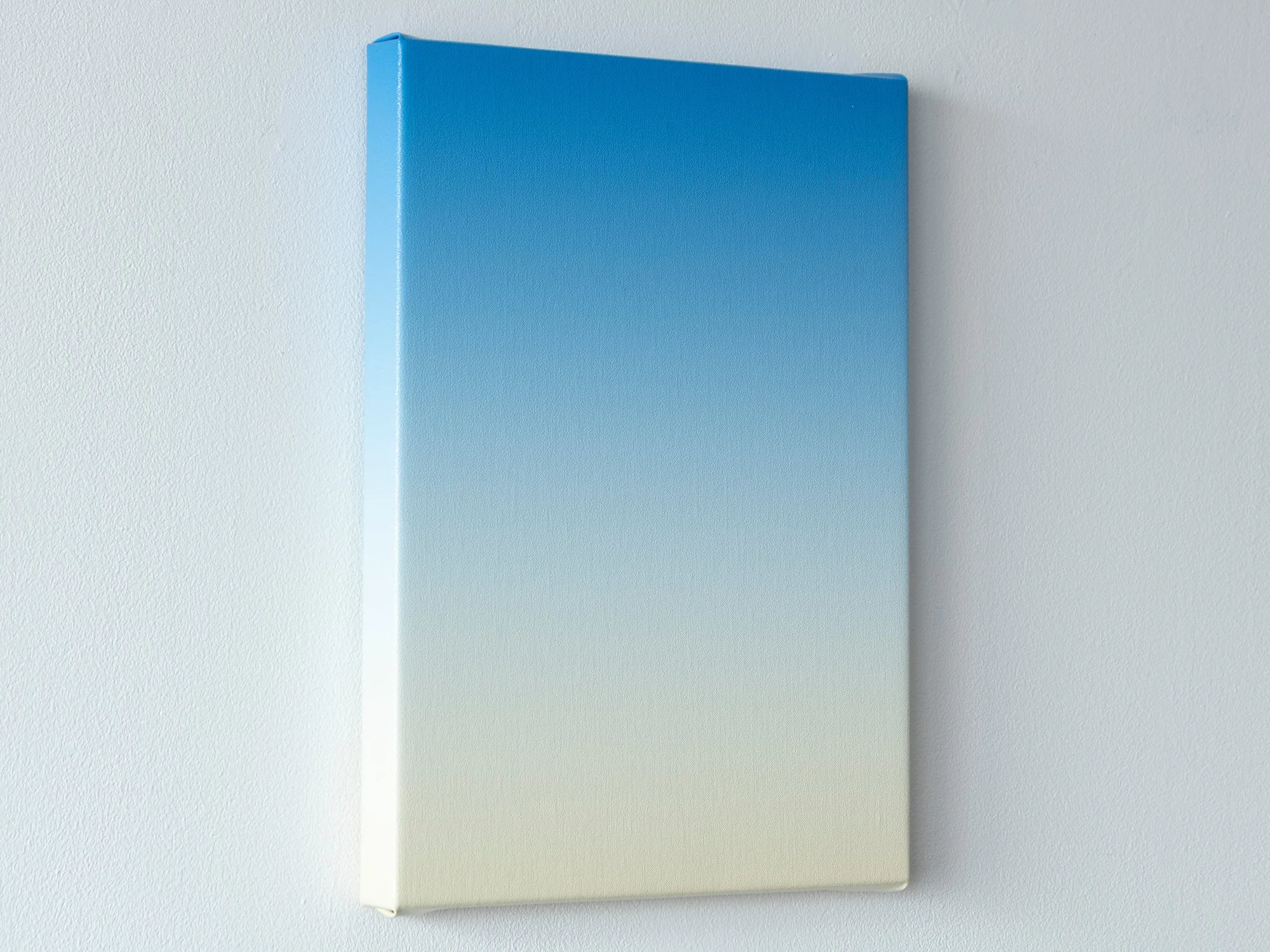 Side view of Cobalt Light by Donald Schenkel, oil on linen on wood, revealing the slim depth of the panel and the even colour transition along the edge.