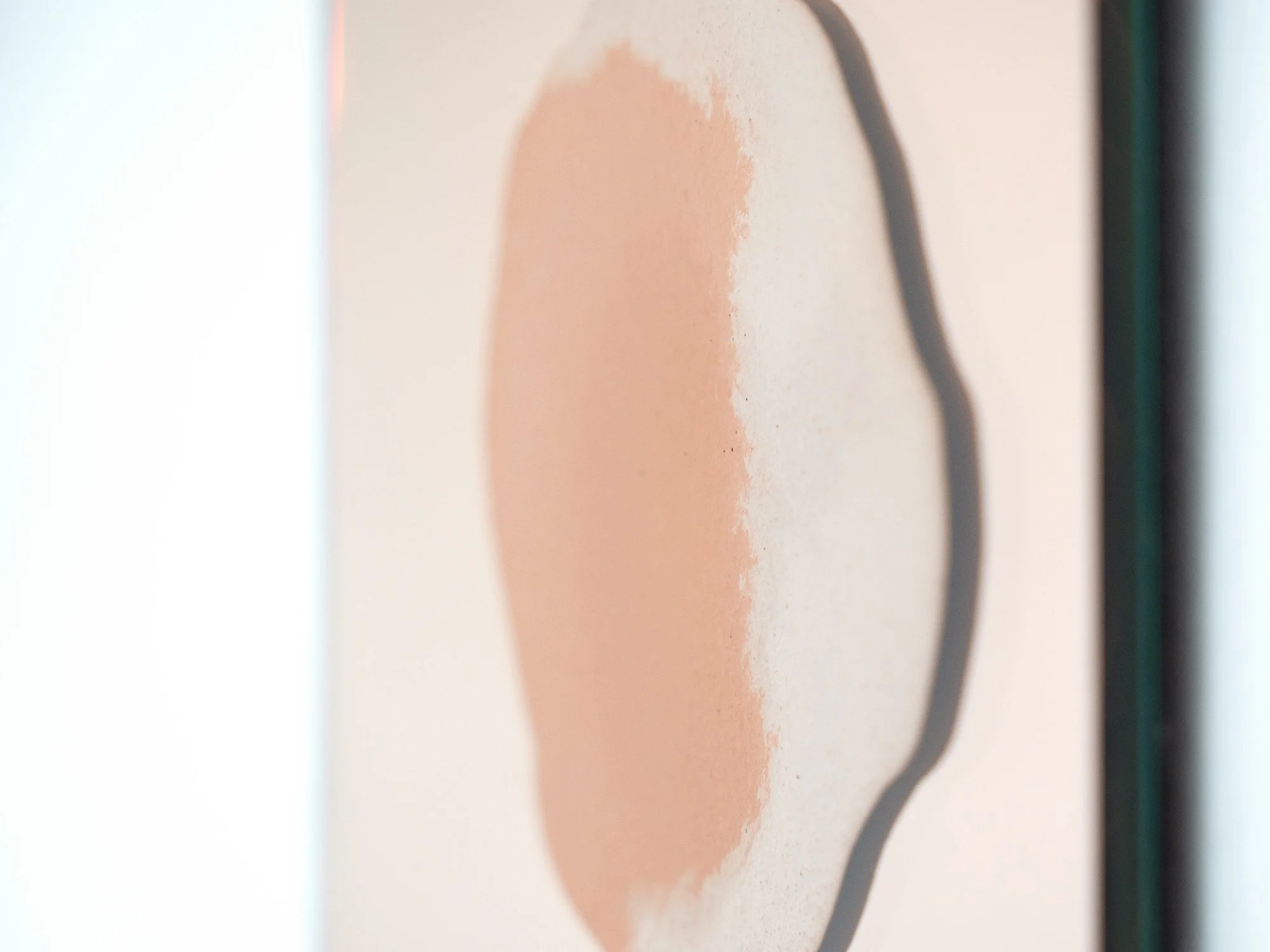 Detail of dusty pink, sand and ochre concrete forms on the rose-coloured mirror of Islands In The Sky IV