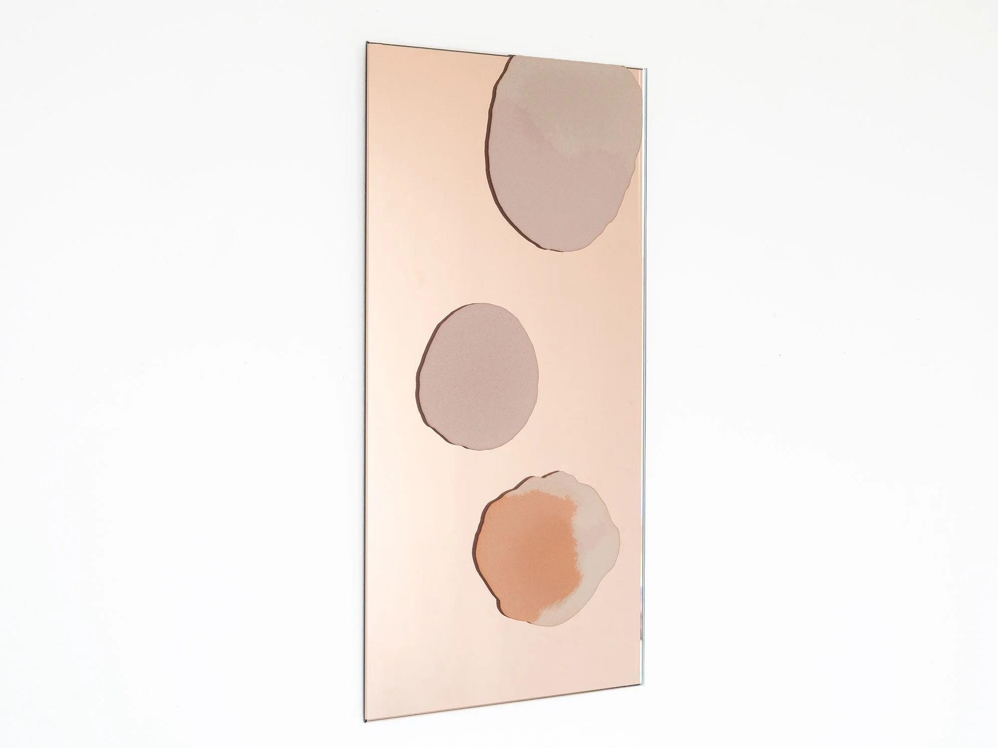 Islands In The Sky IV by Quinda Verheul, a rose mirror wall sculpture with pink and ochre concrete forms inspired by Morocco