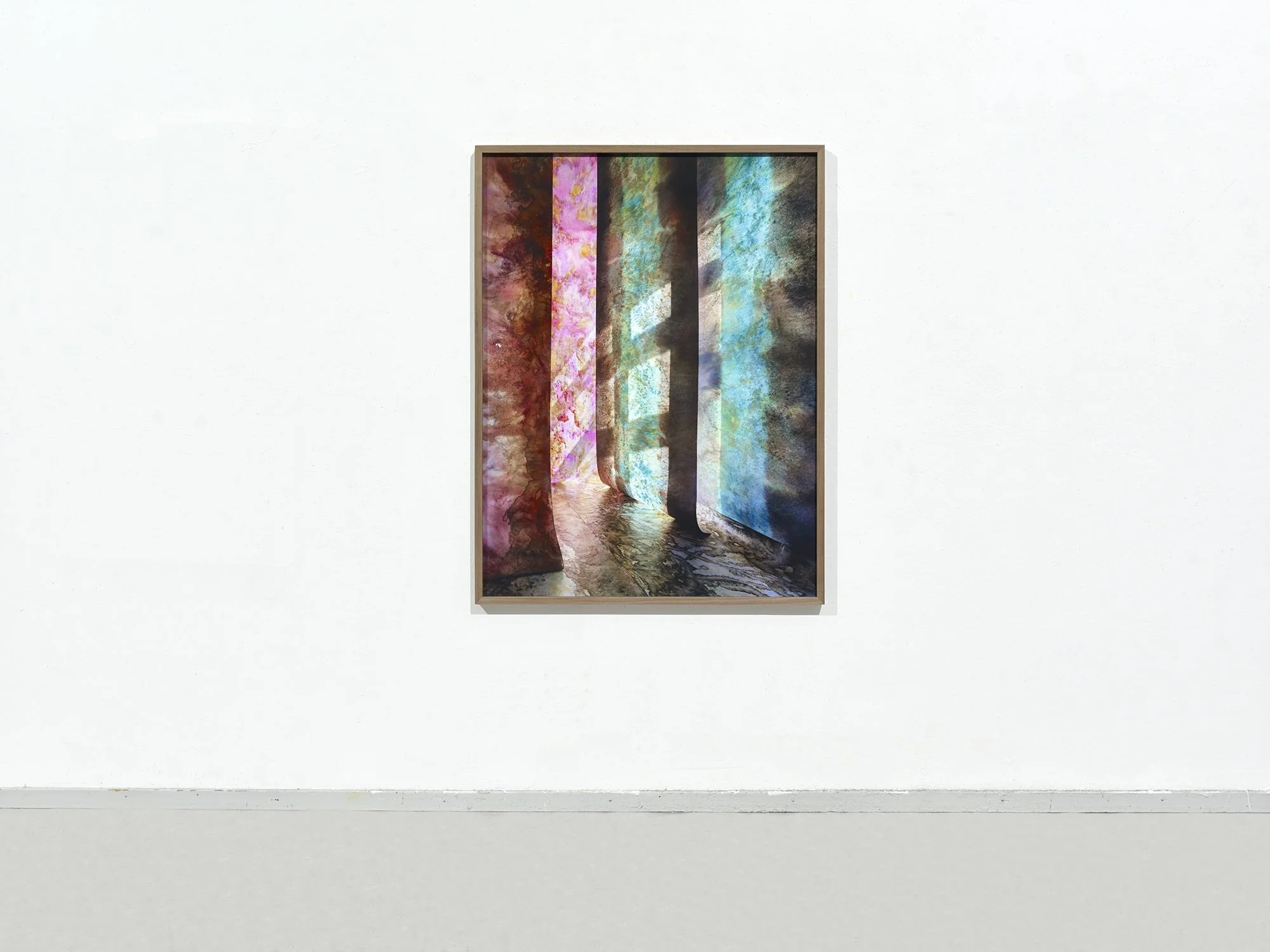 Front view of Overgrown Path 02 by Jan Theun van Rees, with vertical painted textile forms receding into a narrow corridor.