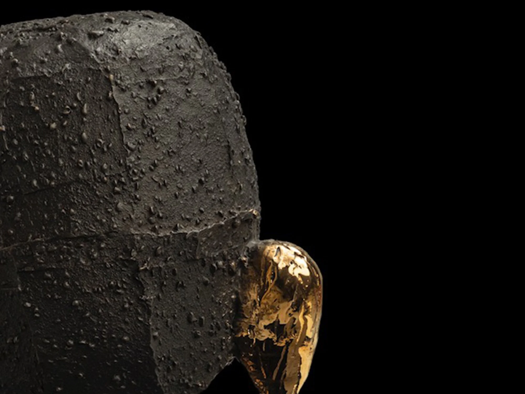 Close-up of Jeske Haak’s bronze sculpture “Caught By Time”, showing textures and organic forms inspired by sea life.