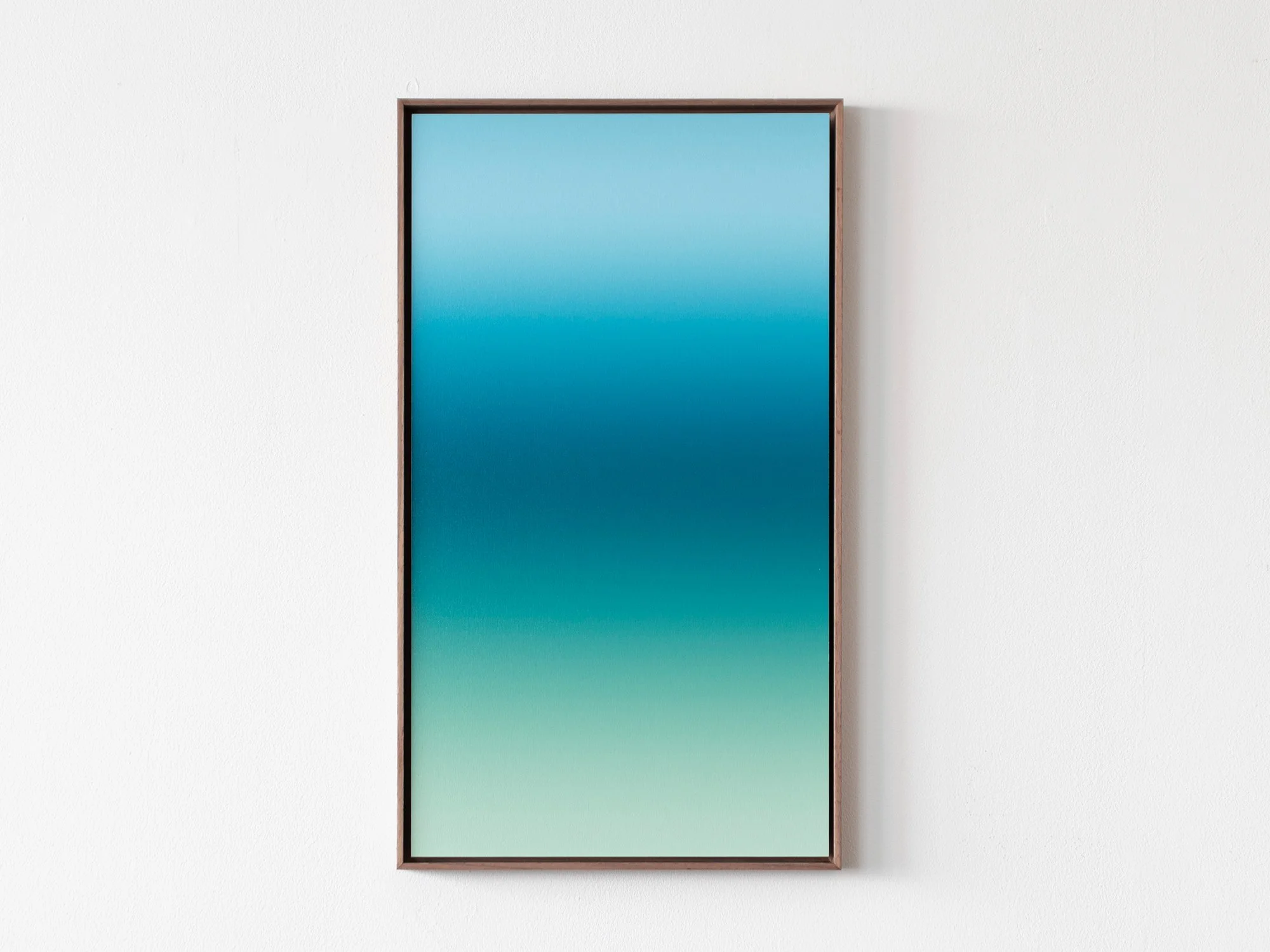 Soft Green Twilight No. 2 (2024) by Donald Schenkel — smooth vertical oil painting with soft gradient from deep teal to pale green, framed in walnut wood.