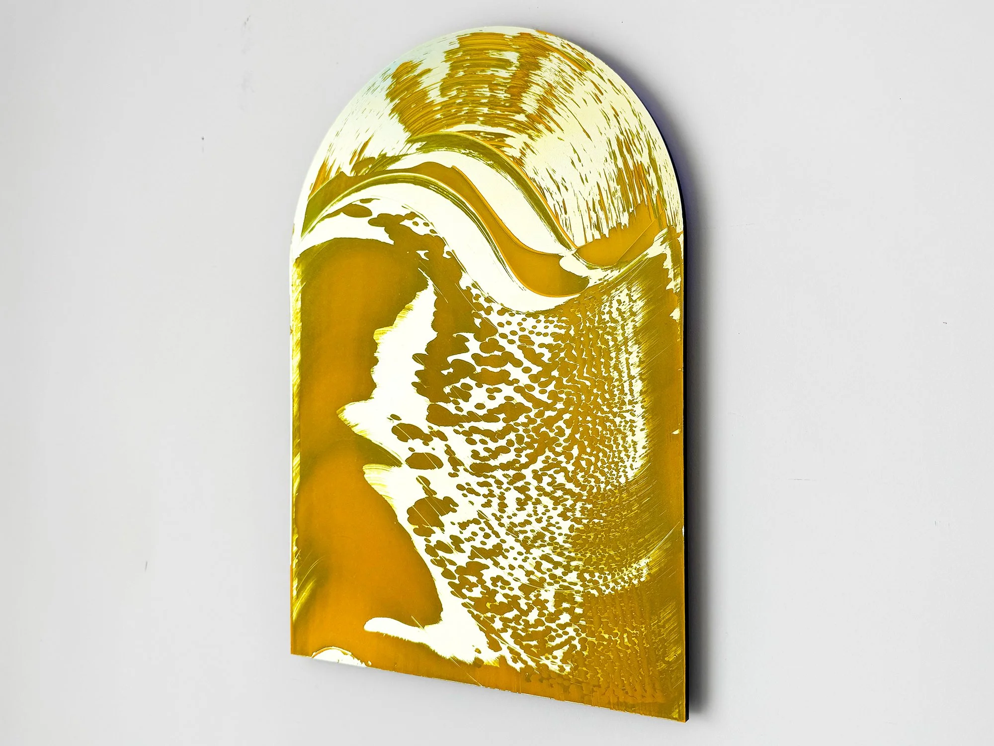 Angled view of Arch II, where the arched top and subtle variations in yellow become more visible across the surface.