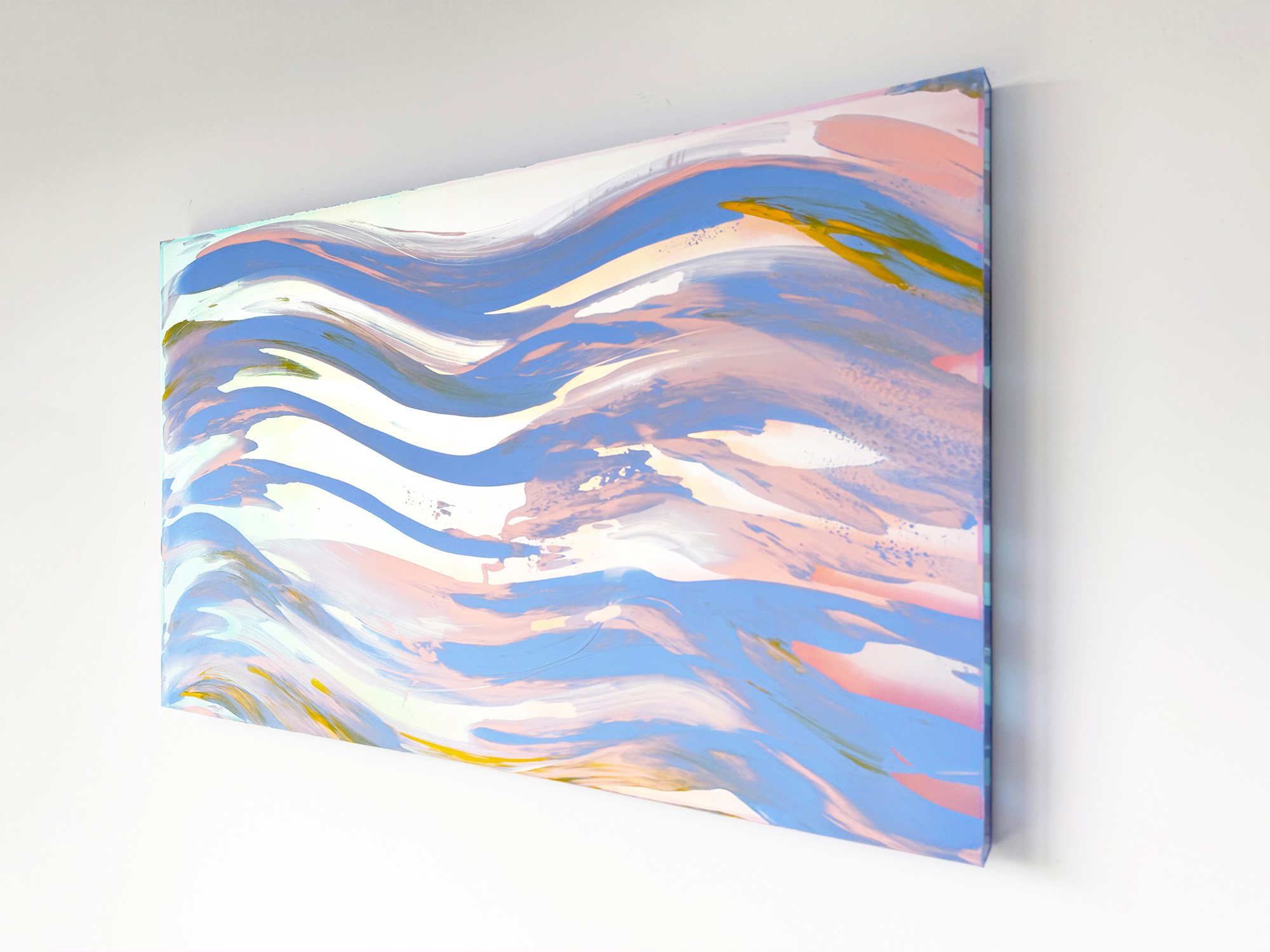 Angled view showing depth and materiality of Lisette Schumacher’s sunrise painting, with soft light reflecting off the surface.