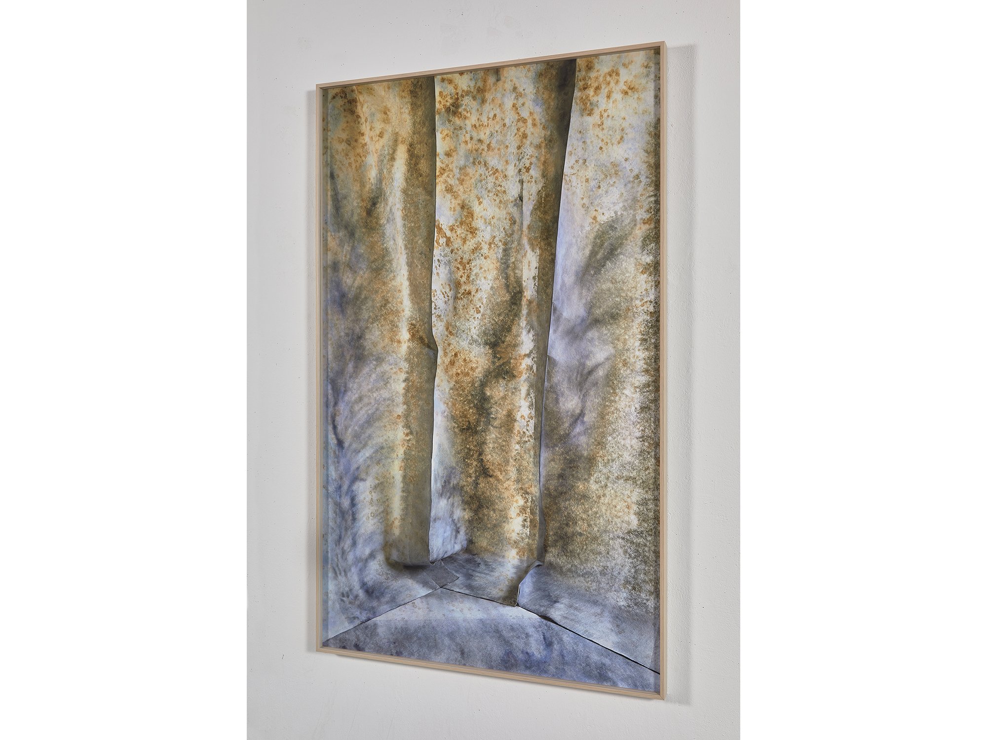 Side view of Dented Space (2025) — painted surfaces and shadows creating an illusion of depth within a constructed interior.