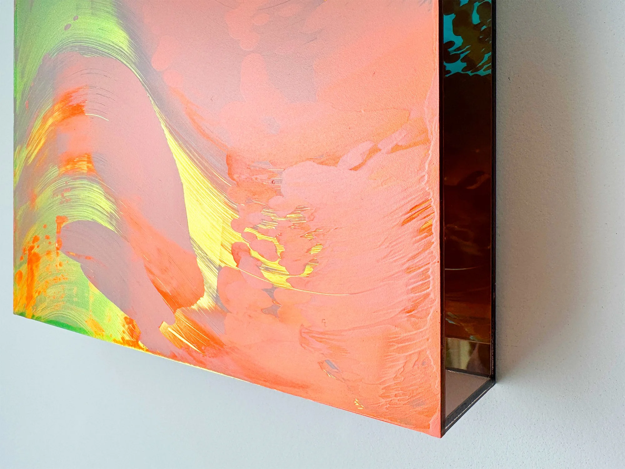 Detail of mixed media surface with sweeping gestures and reflective orange tones