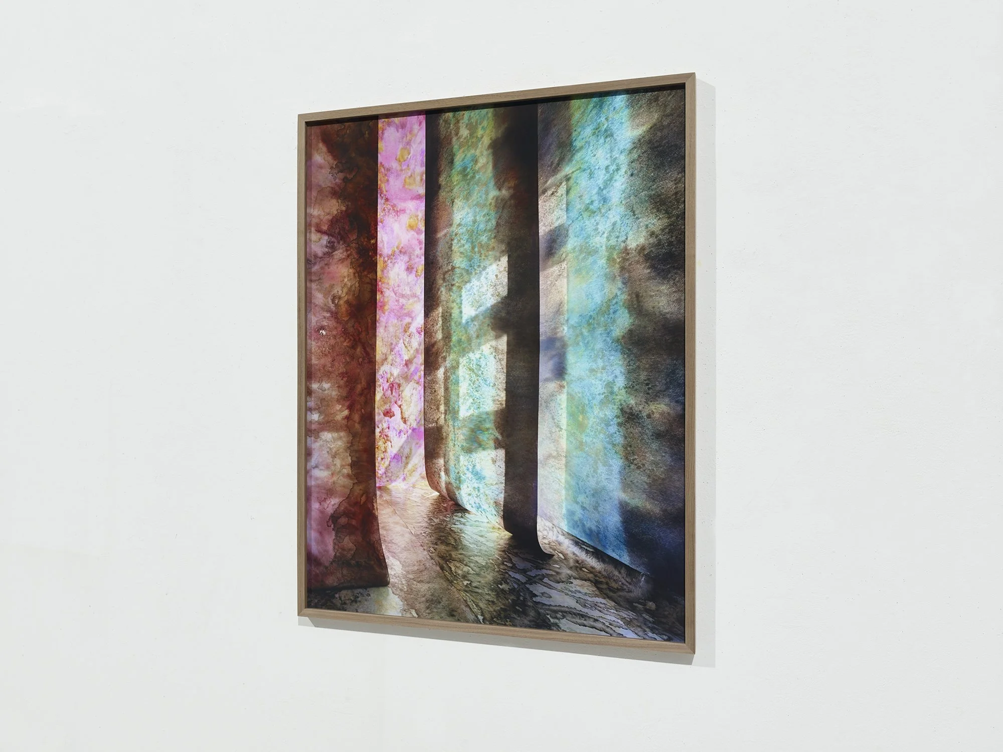 Closer angled view of Overgrown Path 02 by Jan Theun van Rees, with pink and blue-green surfaces framing a dark passage.