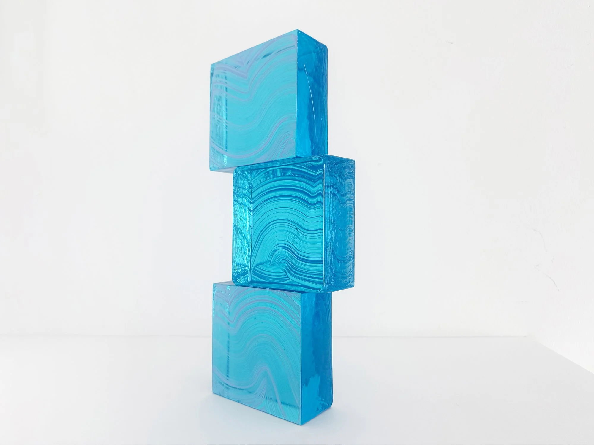 Spatial Shade V by Lisette Schumacher, solid cast glass sculpture with stacked blue modular forms