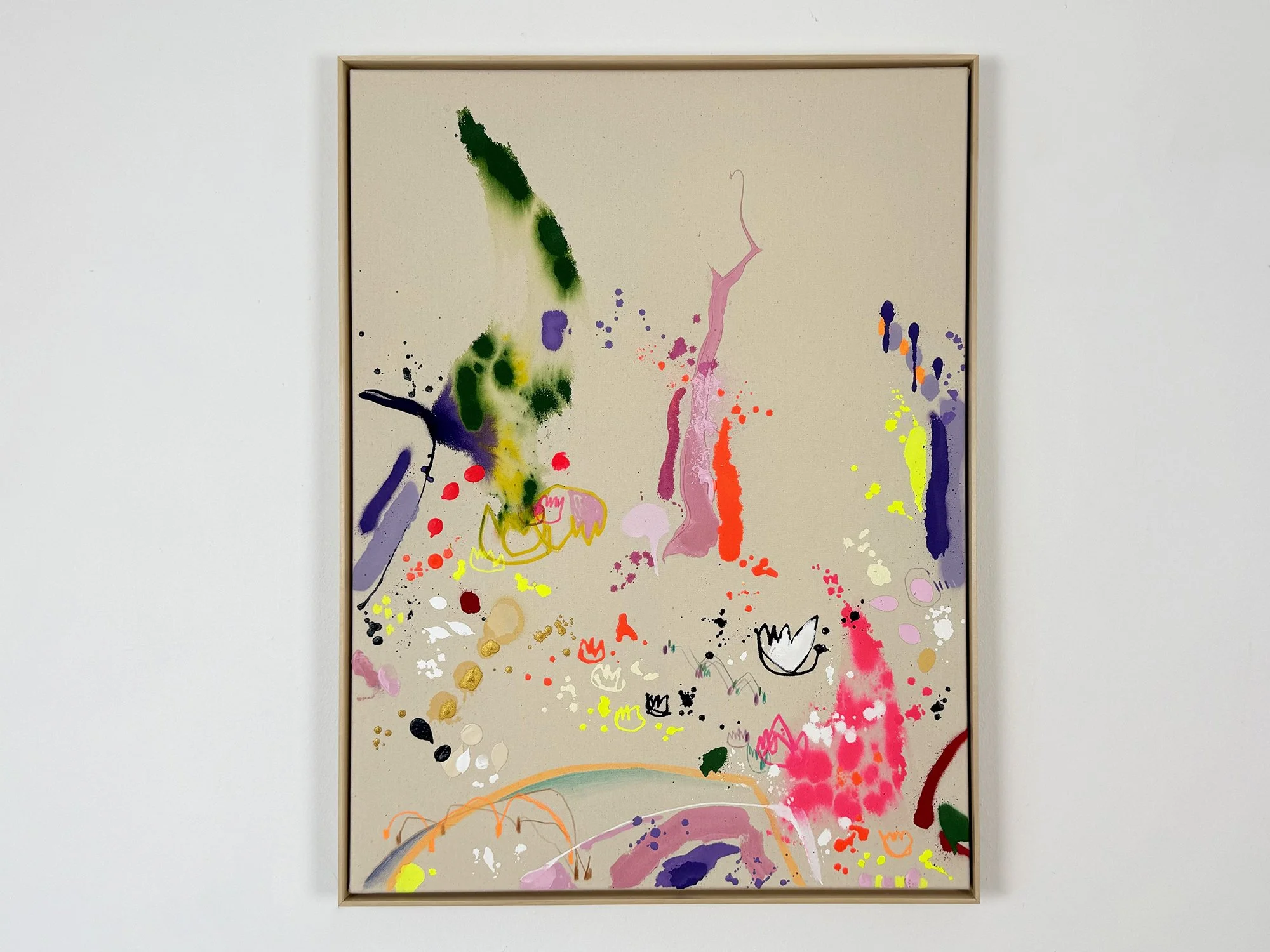 Frühlingstanz (Spring Dance) by Vera Klaus, colourful abstract painting with splashes of pink, green, yellow and violet on raw canvas, shown framed on a gallery wall
