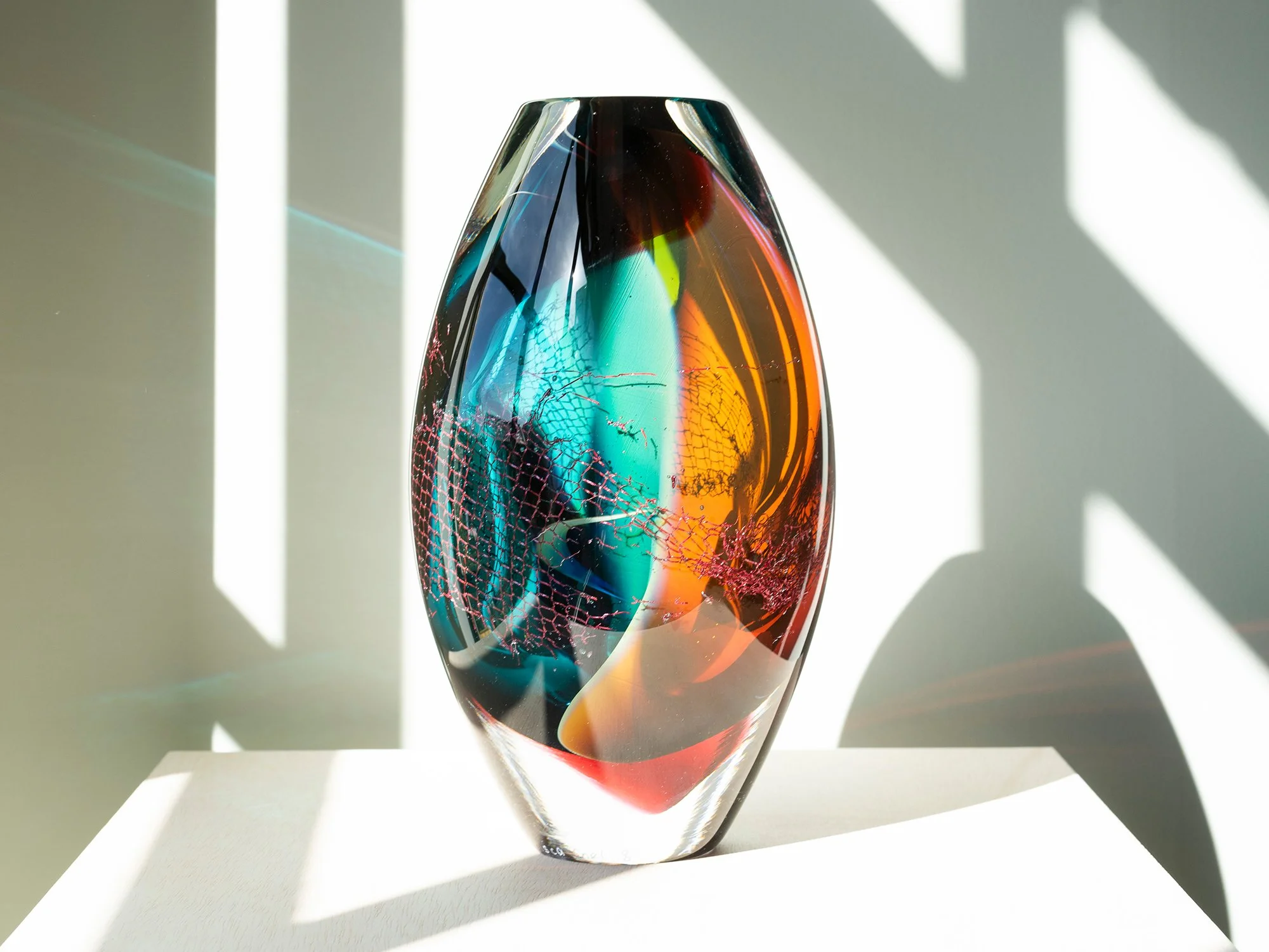 Handmade sculpture by Francisca Snel, showing blue and orange hues