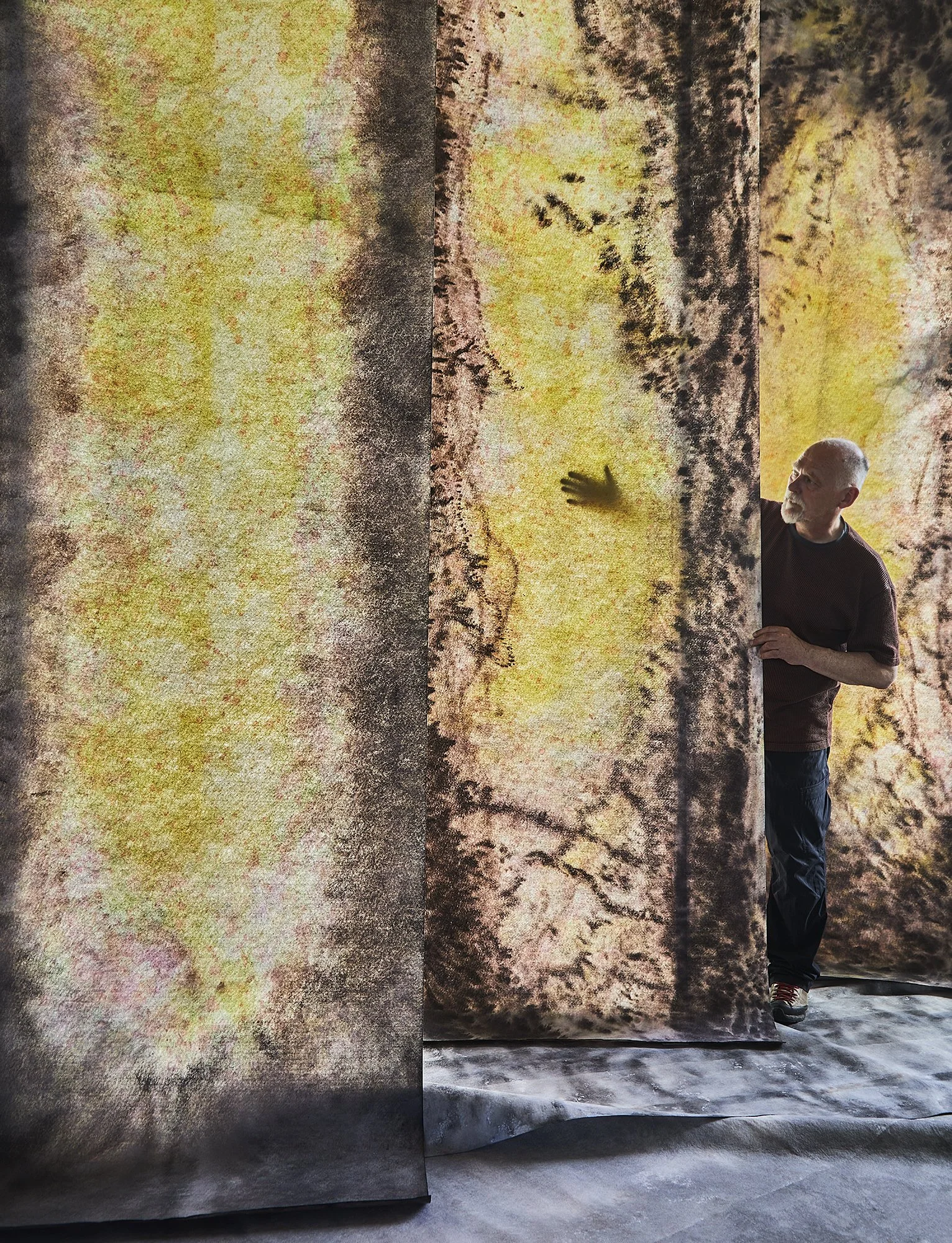 A portrait of Jan Theun van Rees, standing in the middle of his work in progress.