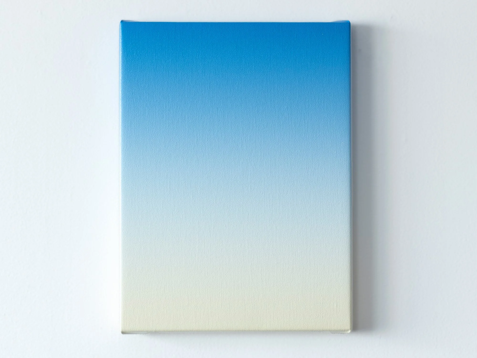 Minimal abstract painting Cobalt Light by Donald Schenkel, oil on linen on wood, showing a smooth gradient from cobalt blue to soft sand tones.