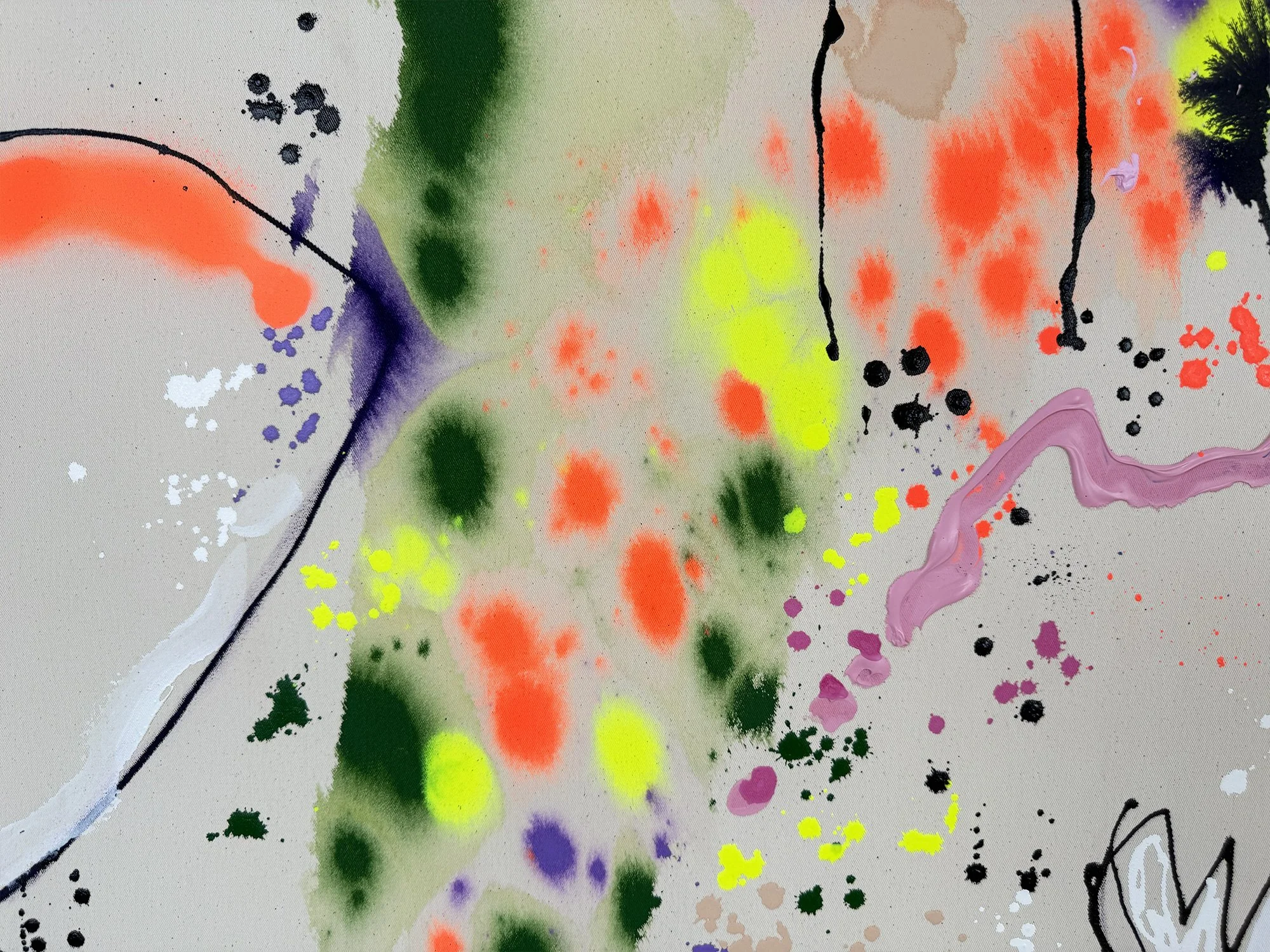 Detail showing bright yellow paint splashes and yellow pigment on raw canvas
