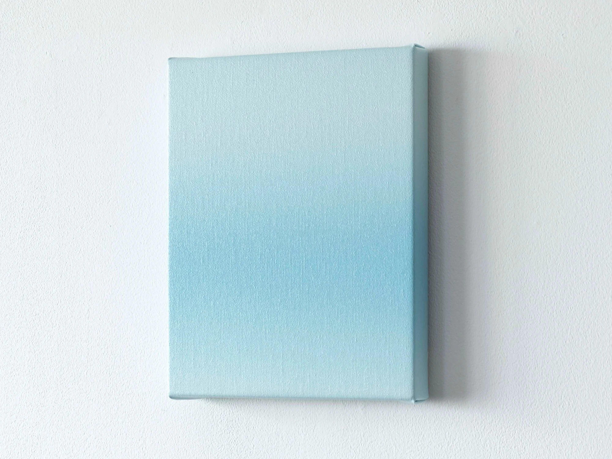 Second side view of a minimal blue gradient work by Donald Schenkel, with gentle tonal shifts visible along the edge.