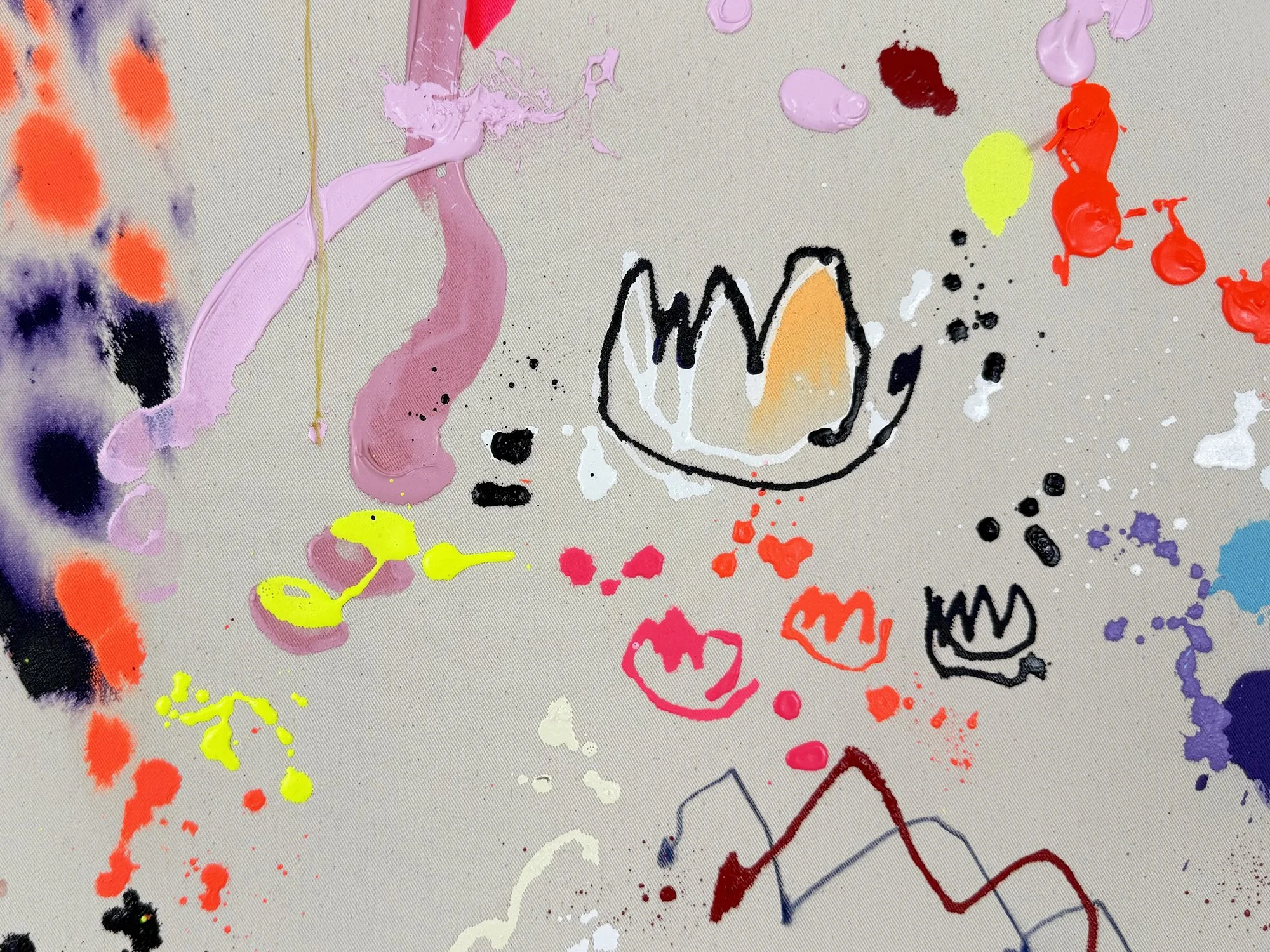 Detail showing purple and orange pigment spreading softly into raw canvas