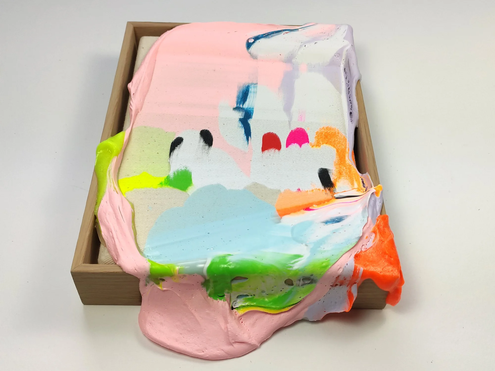 Close-up detail of Karen van de Vliet’s Poppie series, showing textured layers, pigments, and sand-based surface structure