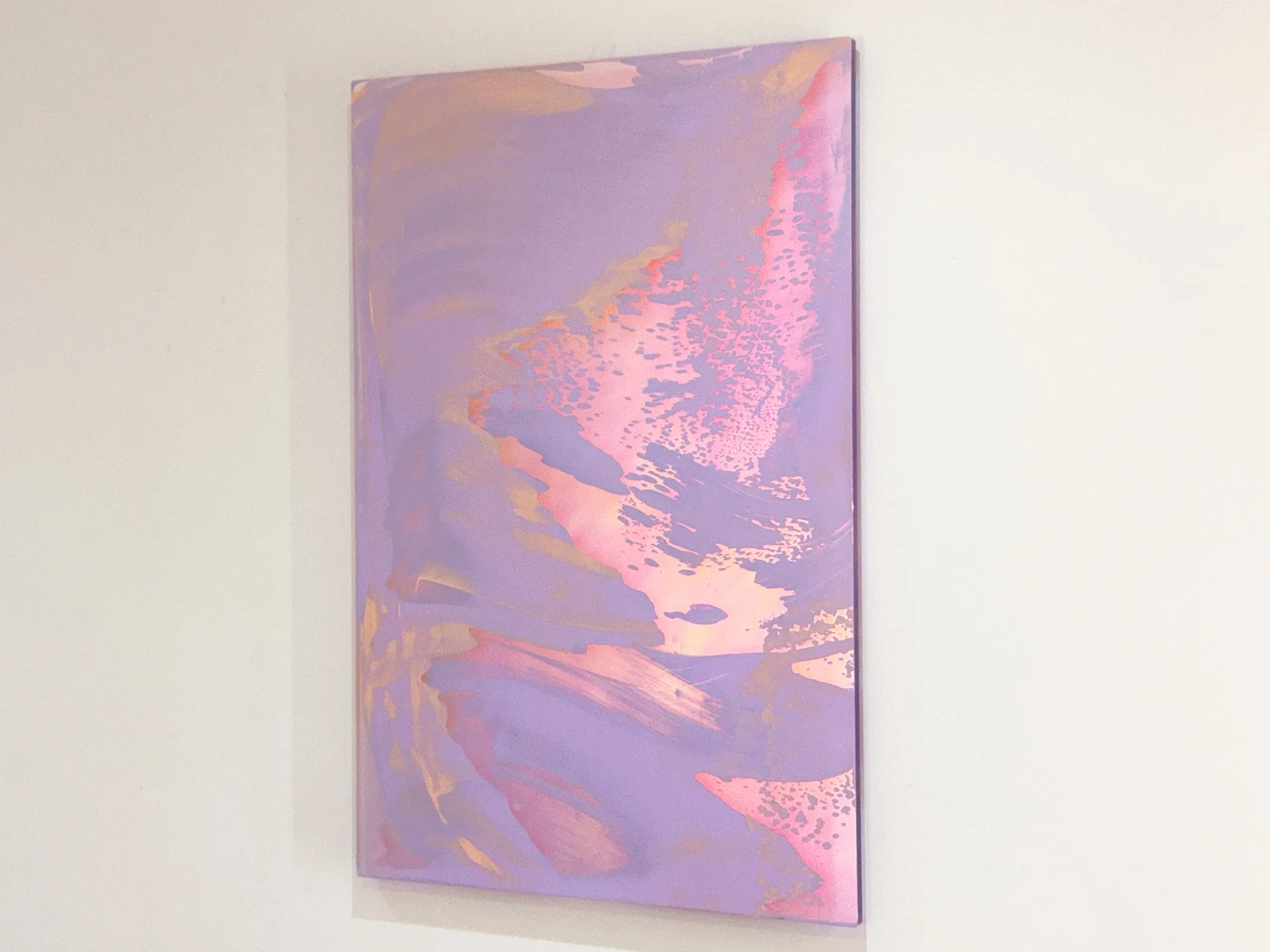 Side view of Lisette Schumacher’s “Dawn”, mixed media painting on panel with shimmering light reflections.