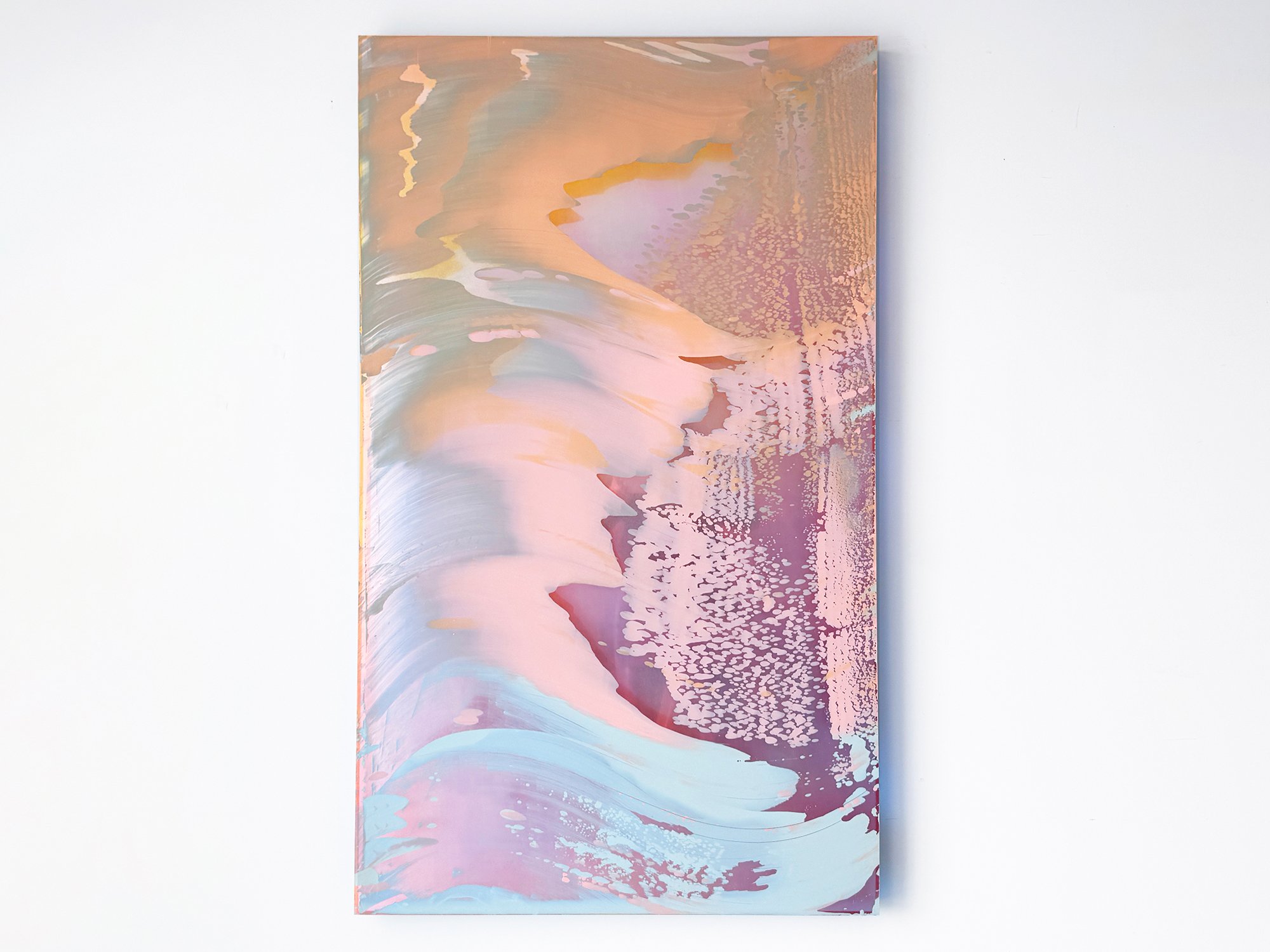 Desert Modernism VII by Lisette Schumacher, an abstract mixed-media painting in peach, pink, pale blue and yellow, shown on a white wall.
