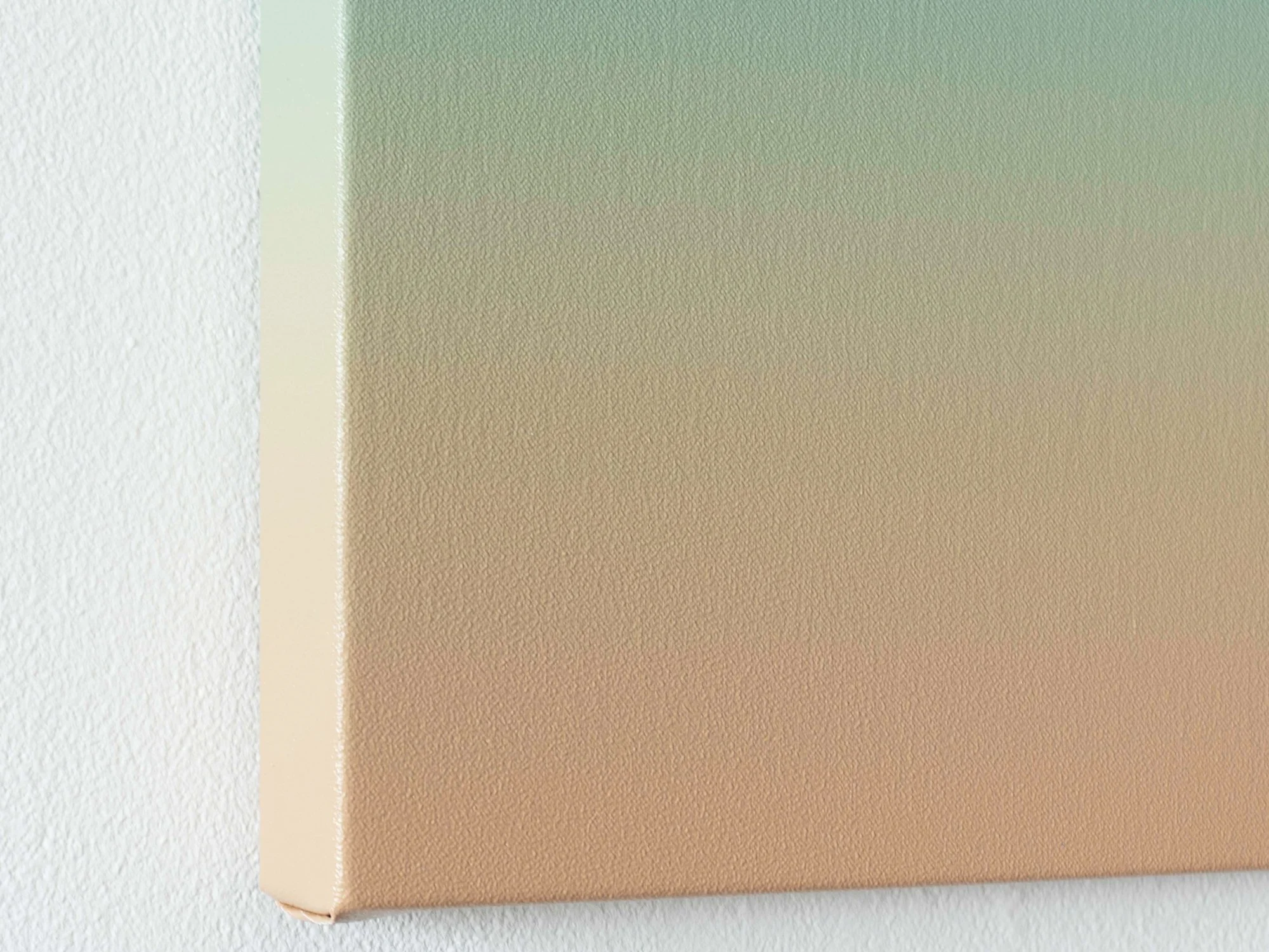 Close-up detail of the fine texture and smooth transition between turquoise blue and sandy beige tones in Soft Lagoon.
