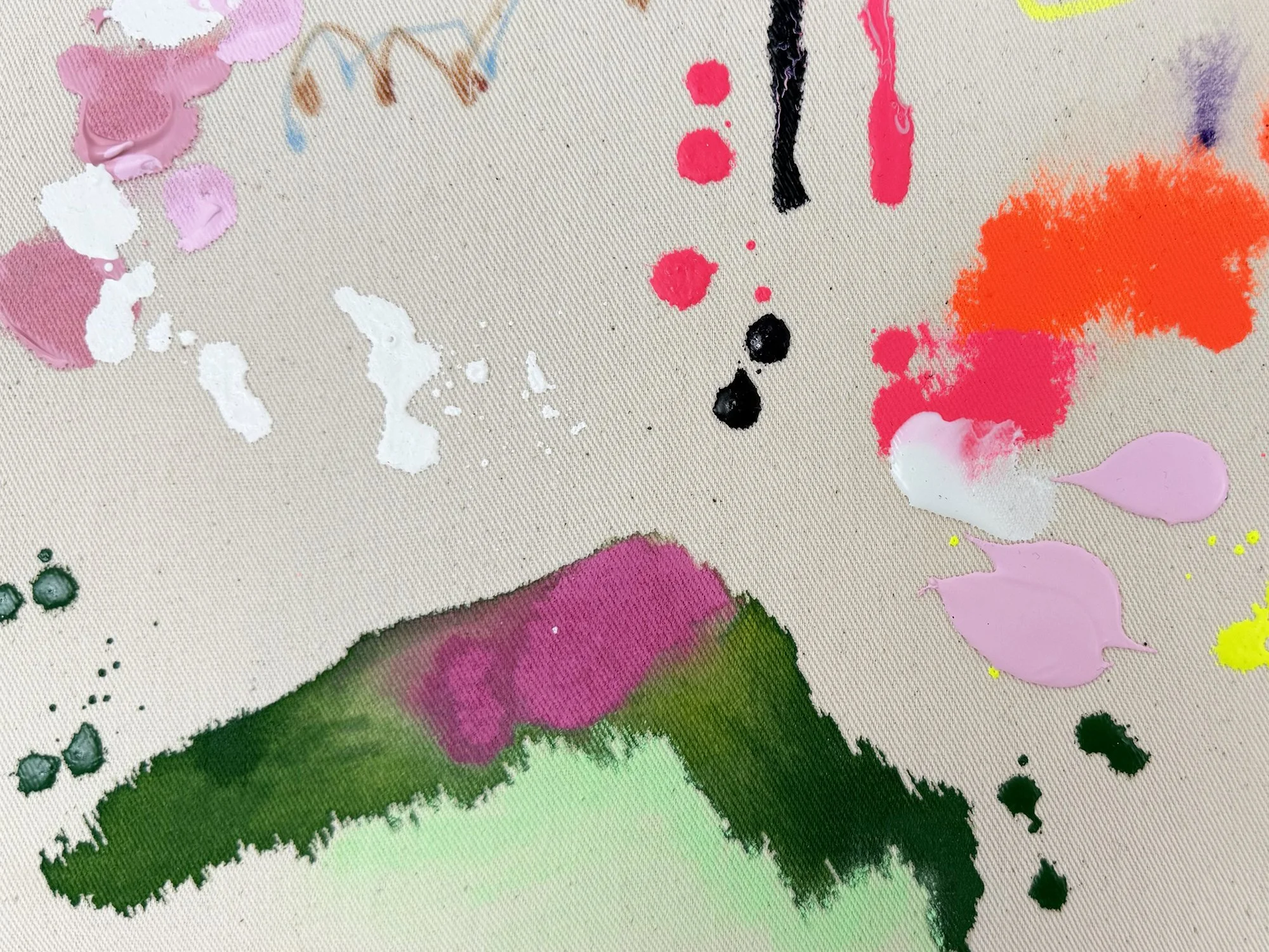 Detail of vibrant orange, black and neon yellow paint marks in a Vera Klaus abstract painting.