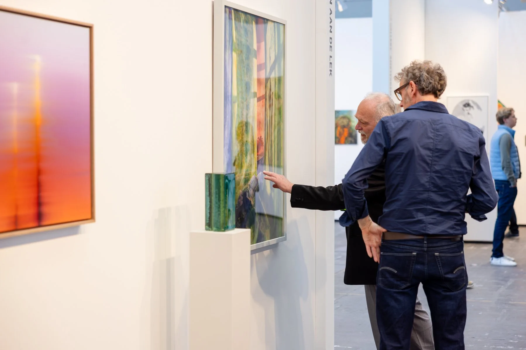 Visitors standing in front of Cactus by Jan Theun van Rees at KunstRAI 2026, showing scale, colour and the interaction between viewer and spatial photography