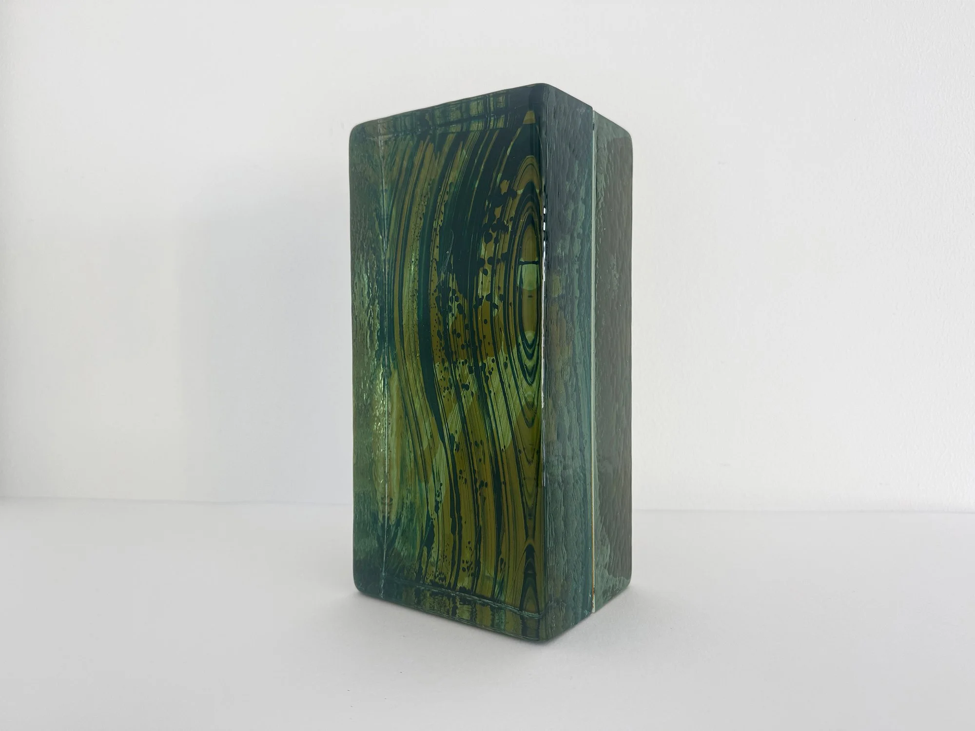 Contemporary glass sculpture Spatial Shade by Lisette Schumacher made of handcast coloured glass with transparent layers