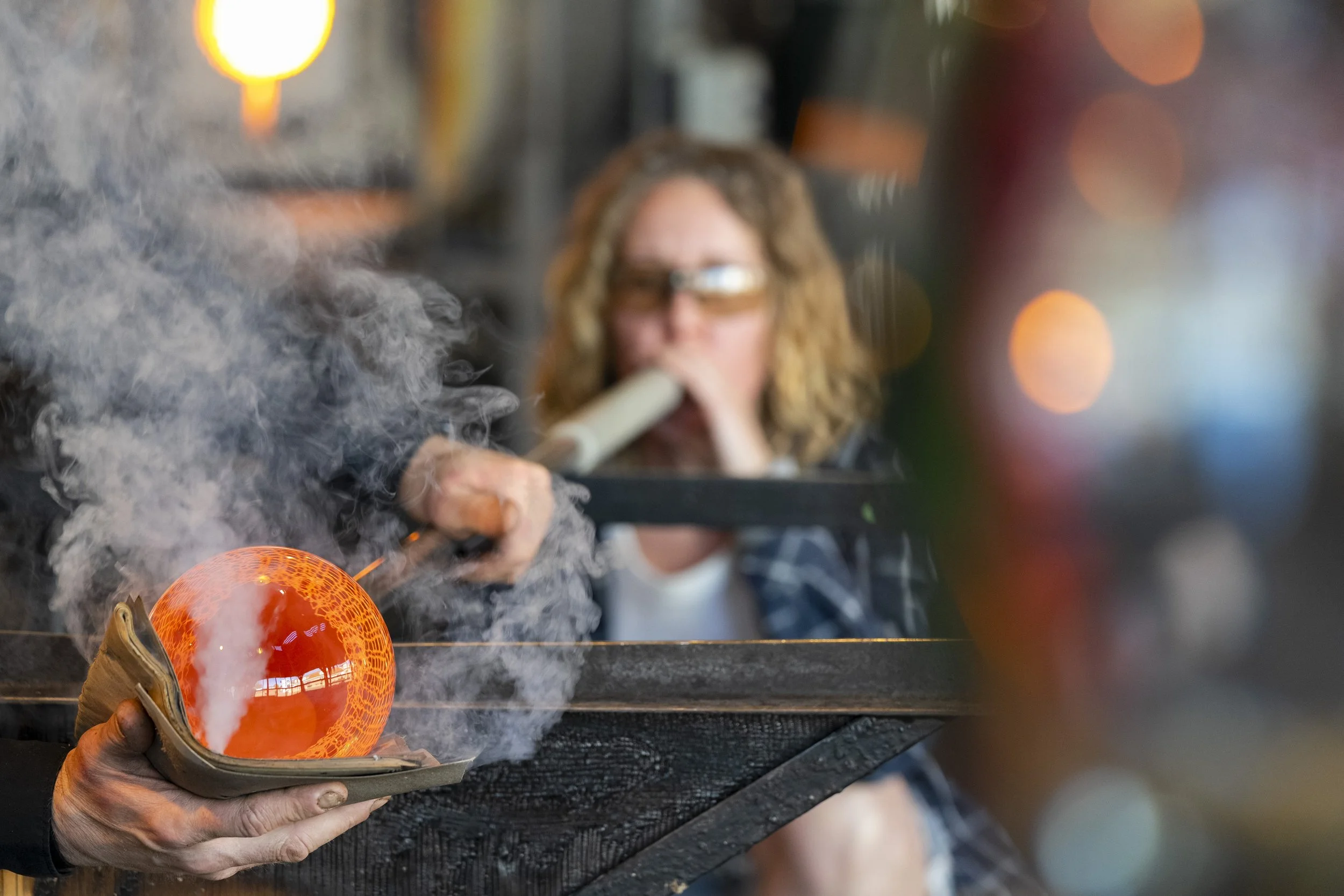Francisca Snel creating a glass sculpture in the glass museum in Leerdam