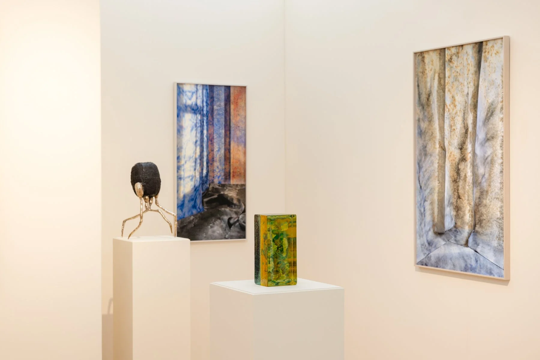 Glass sculpture by Lisette Schumacher, bronze sculpture by Jeske Haak and two architectural photo works by Jan Theun van Rees exhibited at Root Gallery’s booth during PAN Amsterdam 2025.