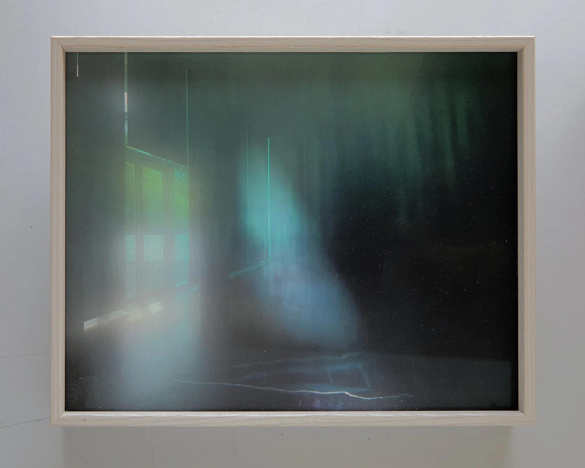 Small framed photograph by Jan Theun van Rees showing a reflection of the Arp Museum interior in an artwork by Axel Hütte