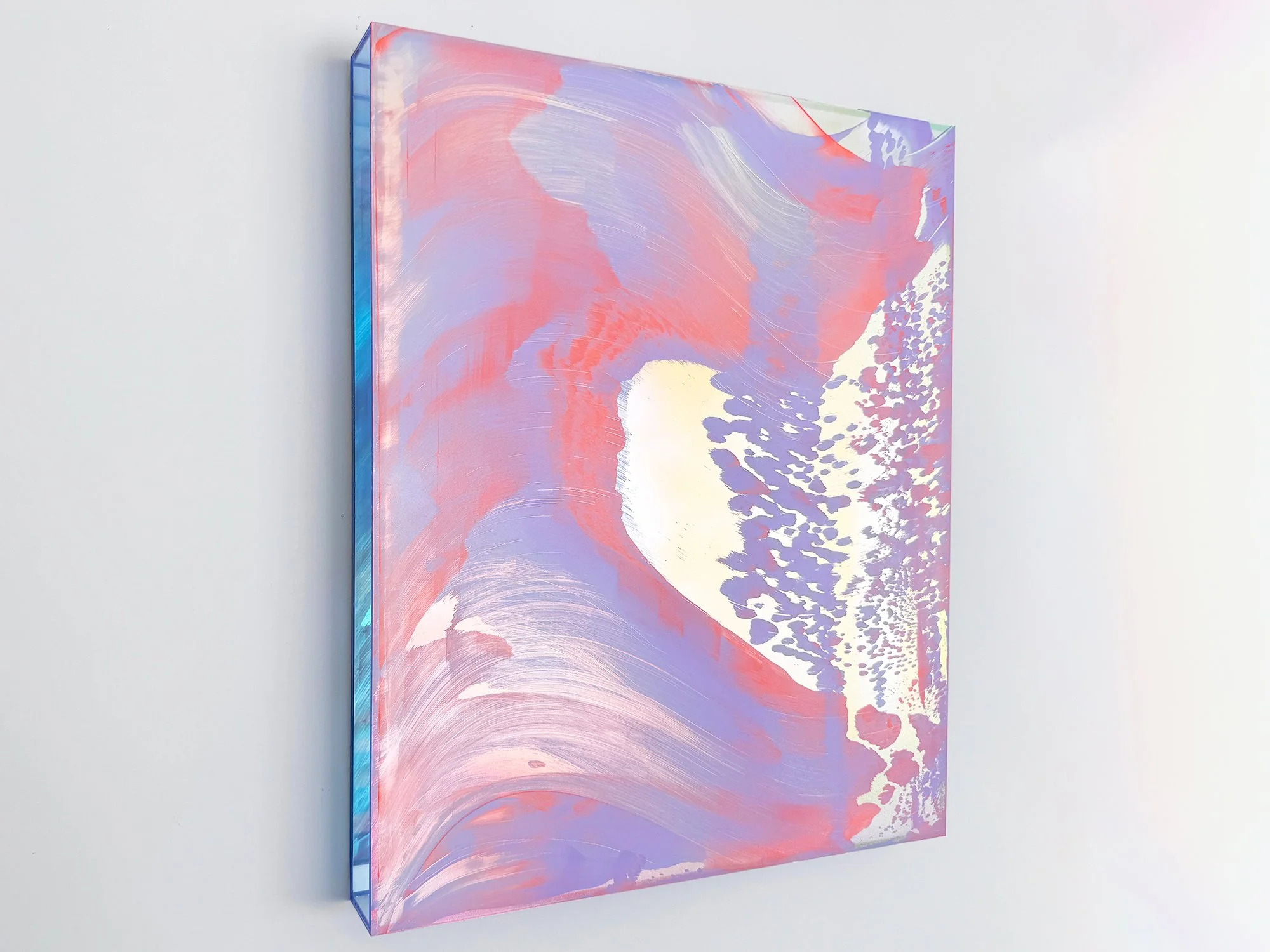 Angled view of Coachella Views XIII showing its slim profile and layered pink and lilac composition