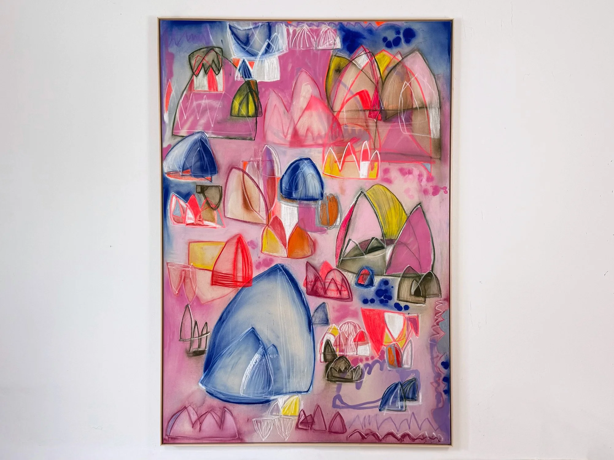 Dreams and Hope by Vera Klaus, a large pink and blue abstract painting measuring 180 × 120 cm, framed and displayed on a white wall.