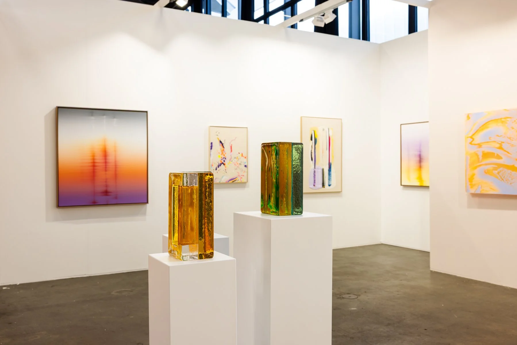 Colourfull paintings by Donald Schenkel, Vera Klaus, Karen van de Vliet and Lisette Schumacher and glass sculptures by Lisette Schumacher in the front