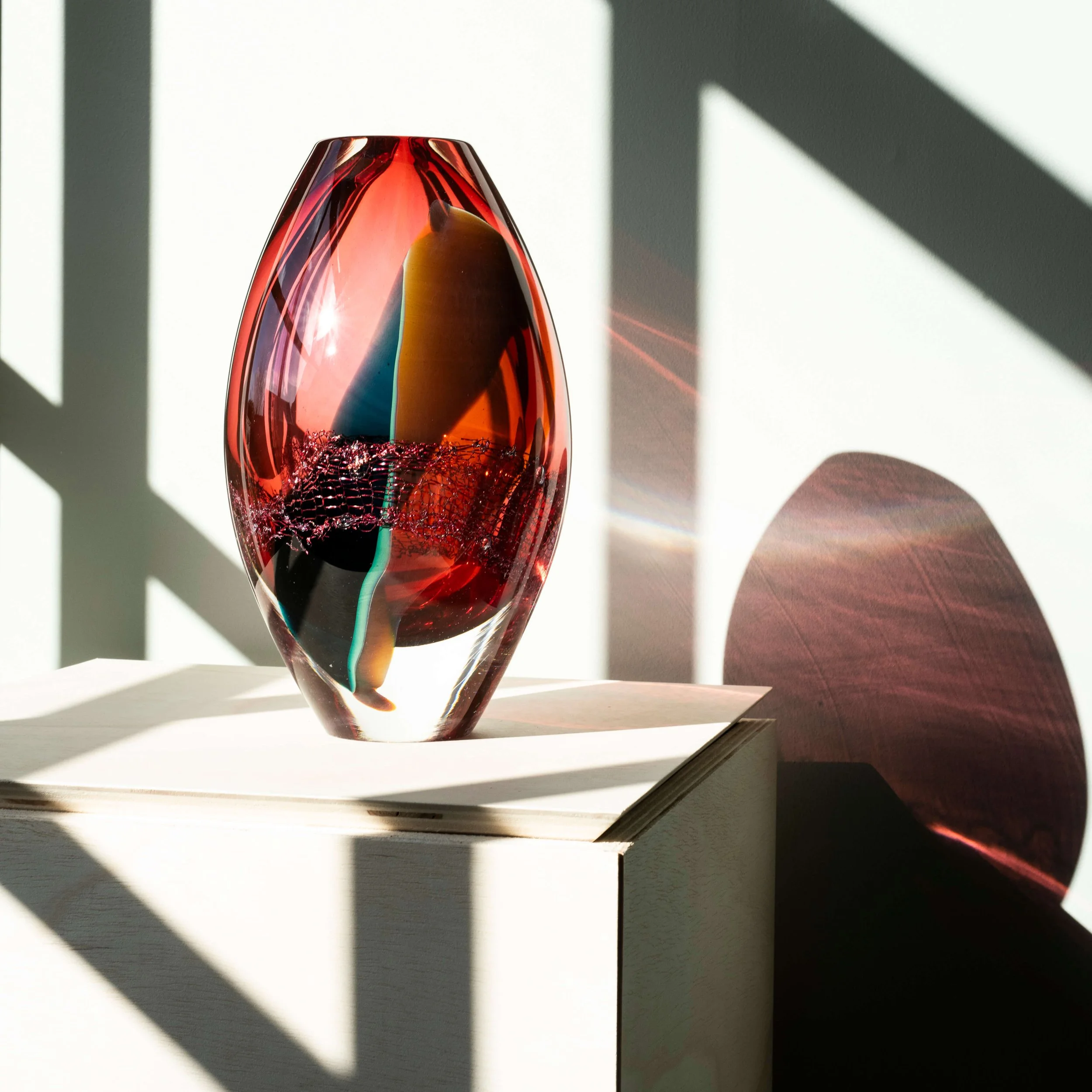 Sculptural artwork by Francisca Snel combining coloured glass and copper in the Crystal Clear series.