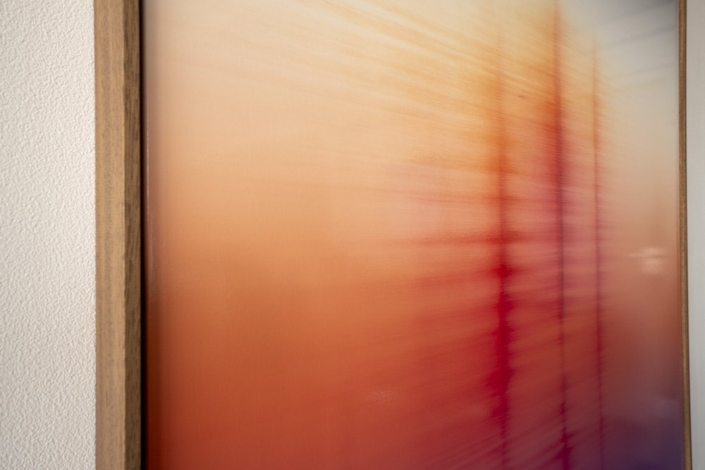 Detail of vertical structures emerging through warm colour field