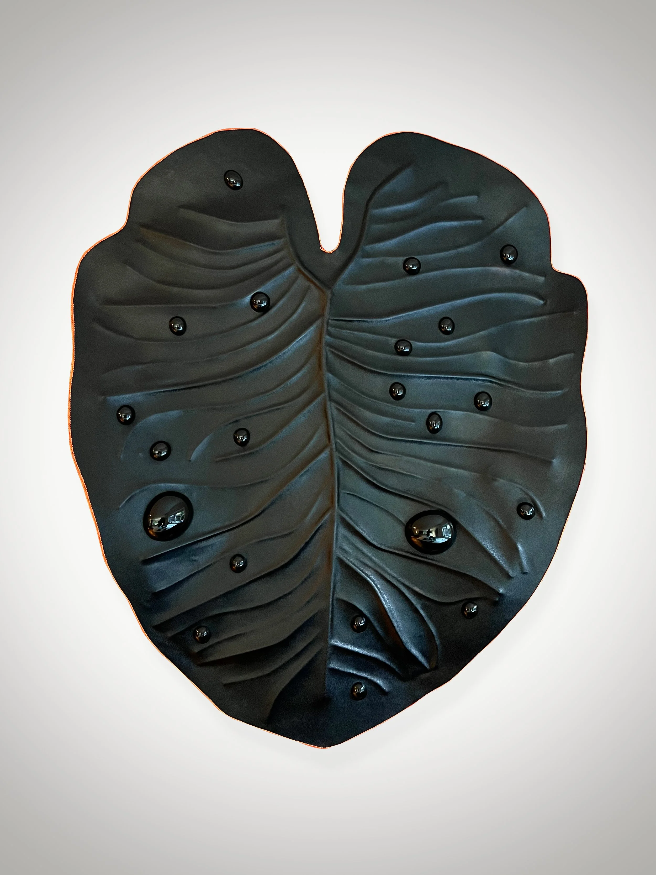 Contemporary leather sculpture by Madelon Uljee, organic form and material detail