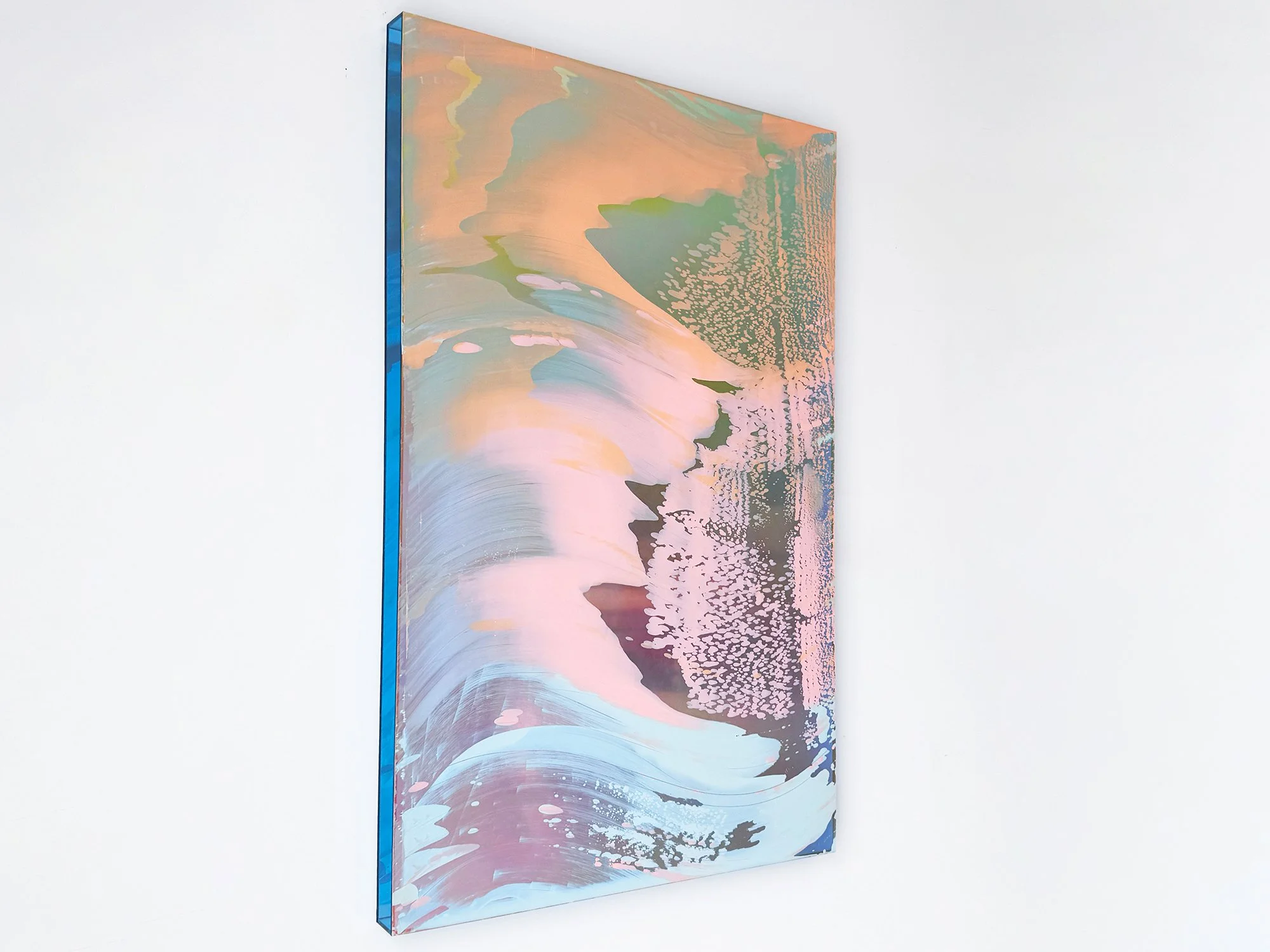 Side view of Desert Modernism VII by Lisette Schumacher, an abstract painting with flowing peach and blue forms and a textured pink field.