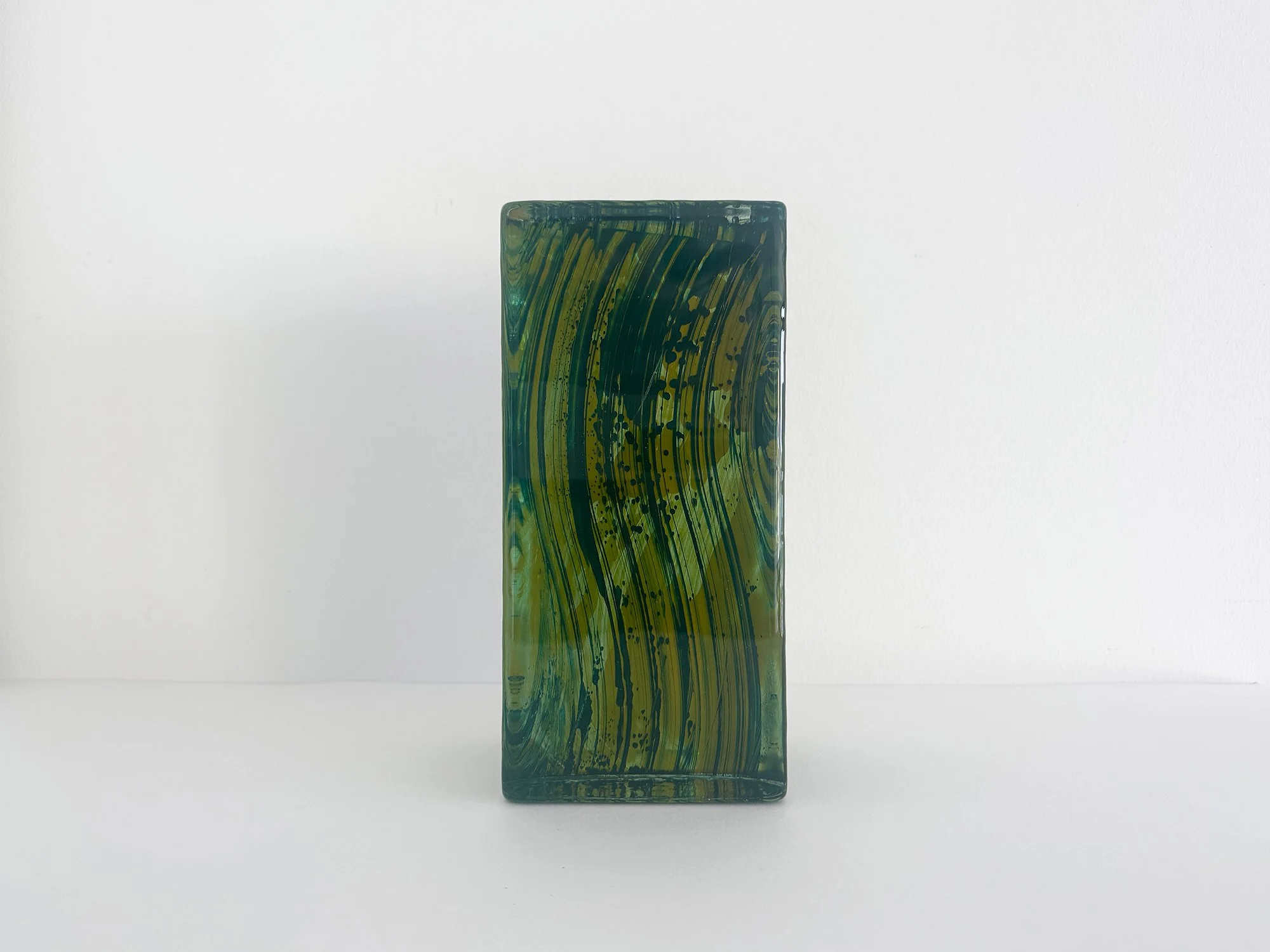 Unique glass sculpture by Lisette Schumacher showing coloured transparent glass and reflections