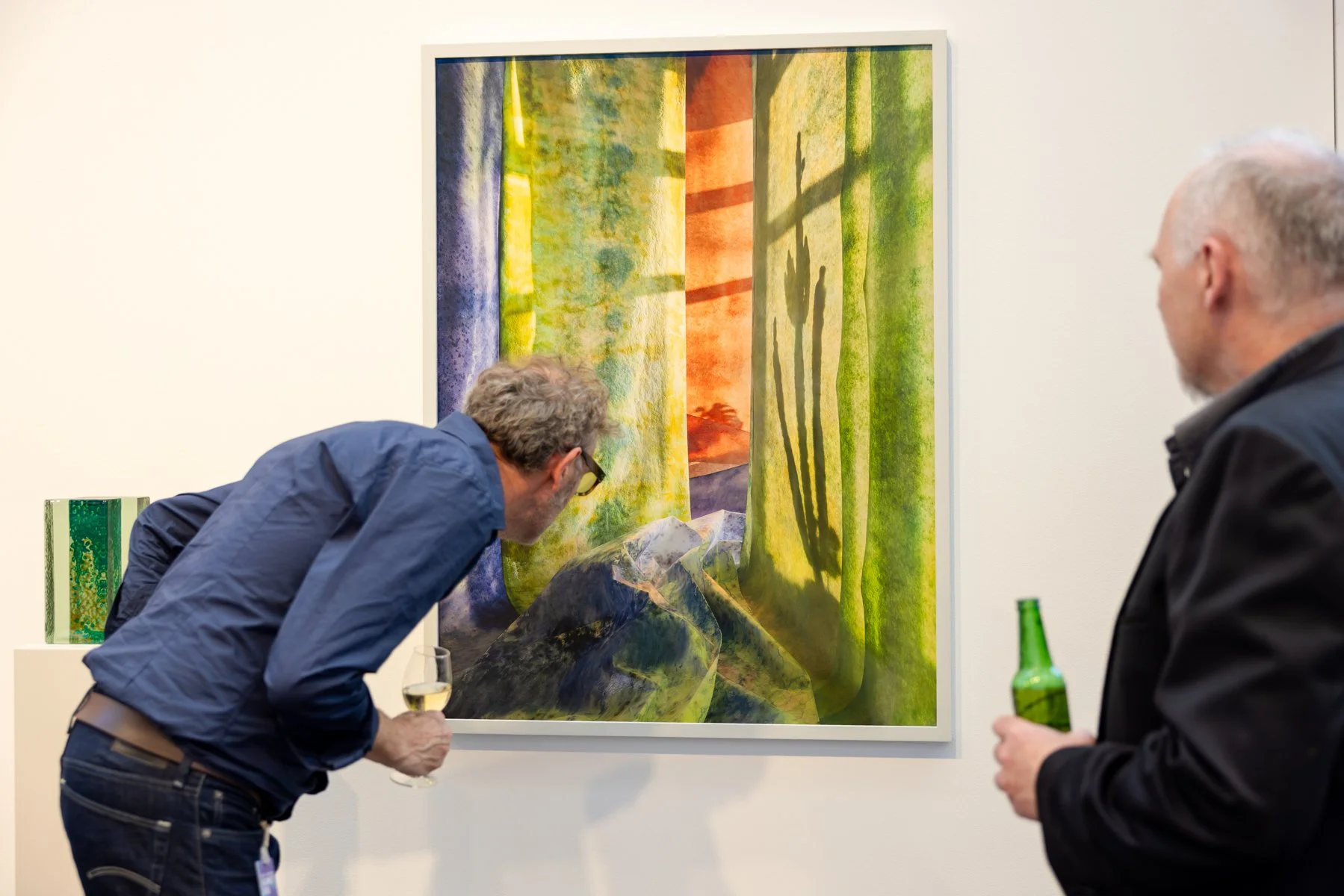 Visitors looking at the newest work by Jan Theun van Rees