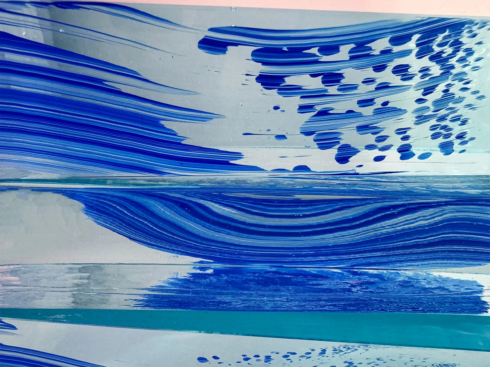 Detail of Spatial Shade I showing translucent glass surface and layered colours