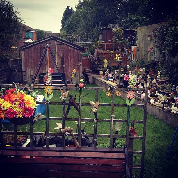 Decent gnome collection at at Grandma @holliekav @avaandrubysmama’s #photo #garden #gnome #igdaily #bestoftheday (Taken with Instagram )