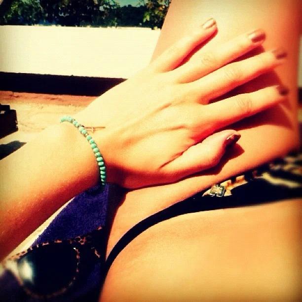After browsing in a few giftshops I planted eyes on this cute turquoise beaded bracelet with tiny gold cross detail. Bargain at €7 What do you think @sophieolearysmith (Taken with Instagram )