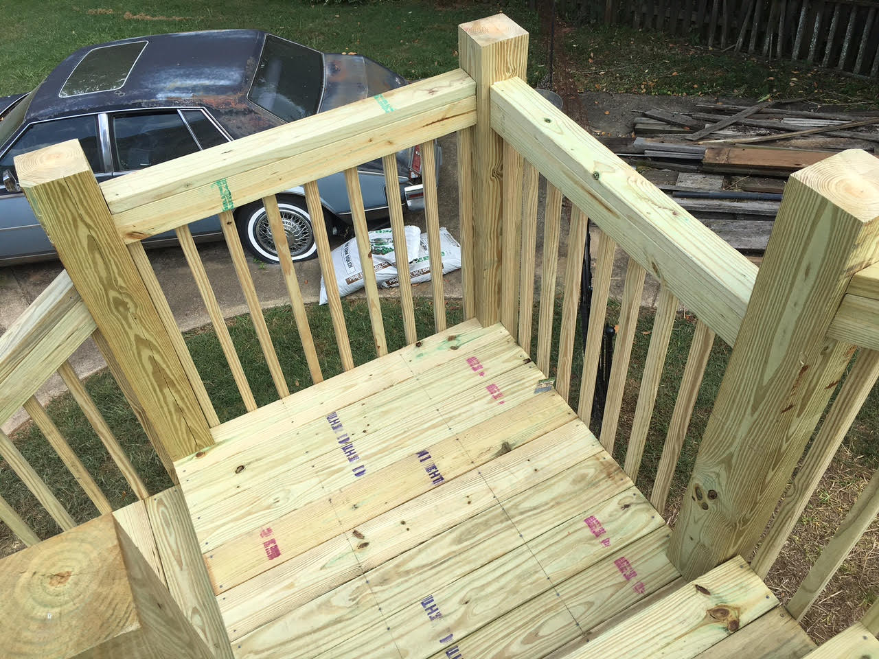 wood deck railing on stair landing